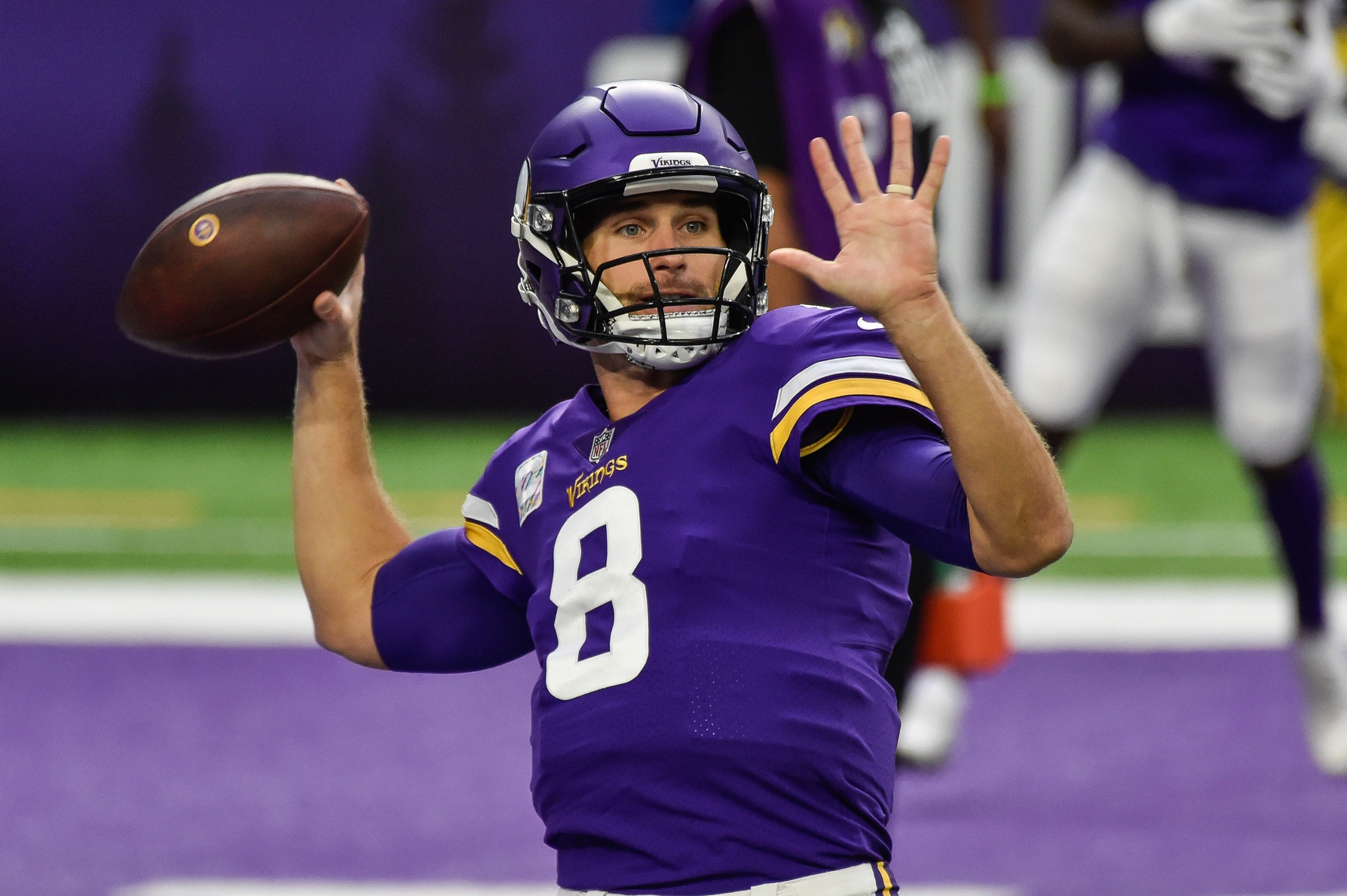 Oct 18, 2020; Minneapolis, Minnesota, USA; Minnesota Vikings quarterback Kirk Cousins (8) warms up before the game against the Atlanta Falcons at U.S. Bank Stadium.