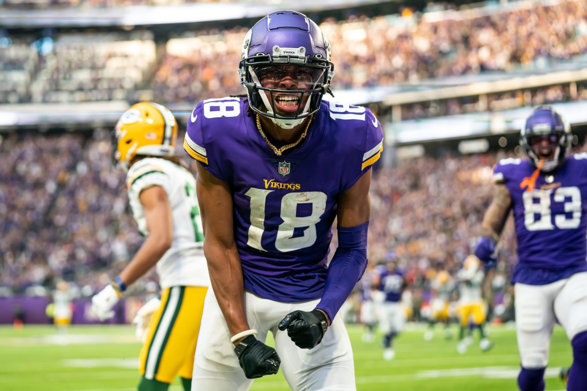 Nov 21, 2021; Minneapolis, Minnesota, USA; Minnesota Vikings wide receiver Justin Jefferson (18) celebrates a touchdown during the fourth quarter against the Green Bay Packers at U.S. Bank Stadium.