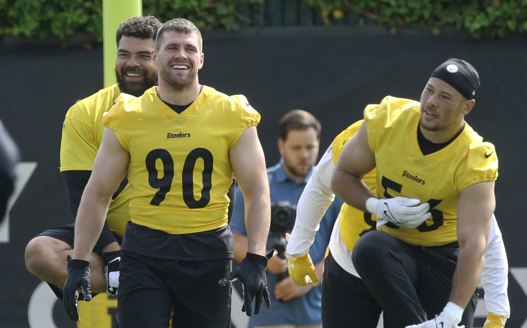 May 24, 2022; Pittsburgh, PA, USA; Pittsburgh Steelers defensive end Cameron Hayward (rear) and linebackers TJ Watt (90) and Alex Highsmith (56) participate in organized team activities at UPMC Rooney Sports Complex.