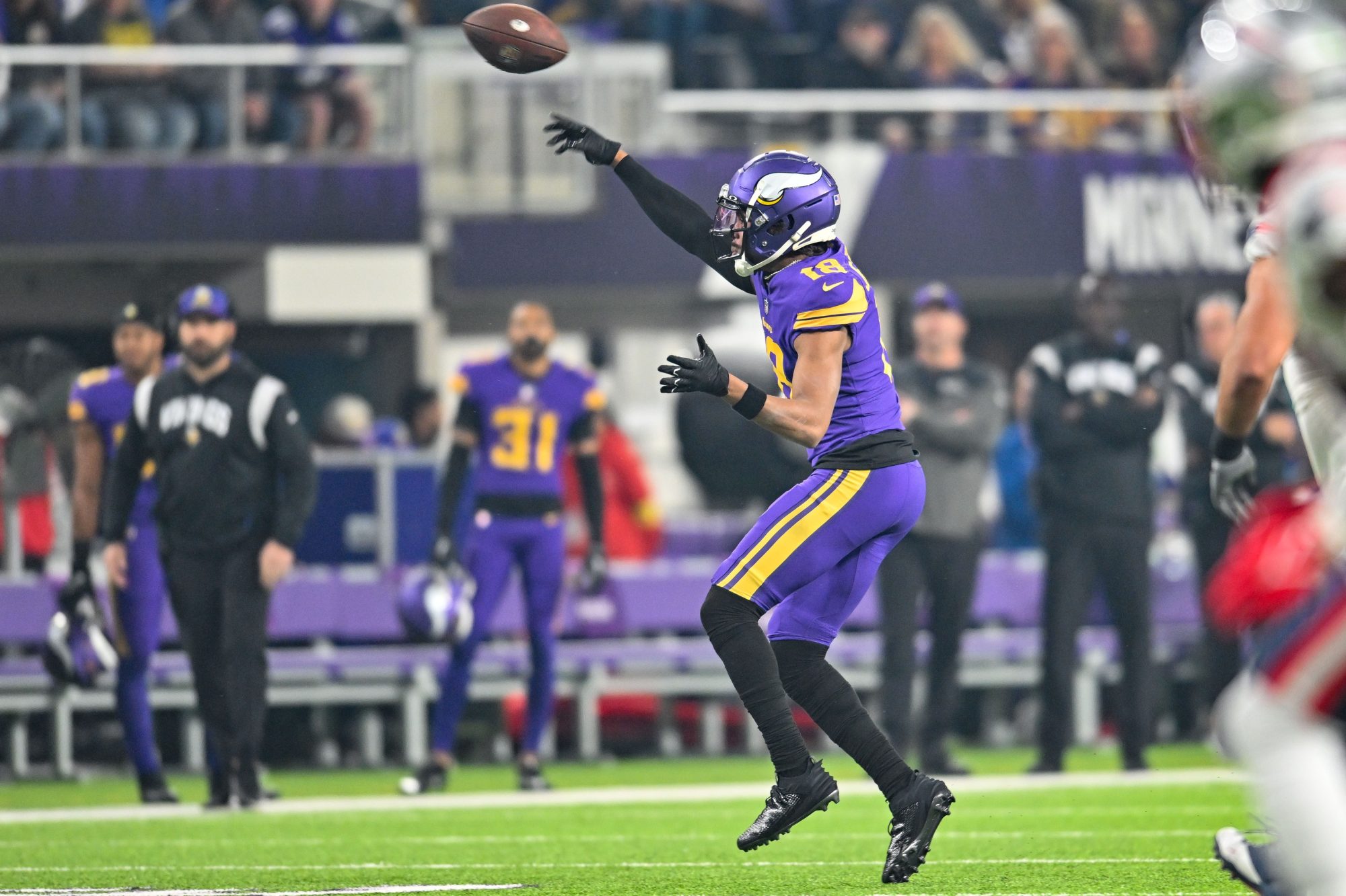 Nov 24, 2022; Minneapolis, Minnesota, USA; Minnesota Vikings wide receiver Justin Jefferson (18) throws a pass against the New England Patriots during the first quarter at U.S. Bank Stadium.