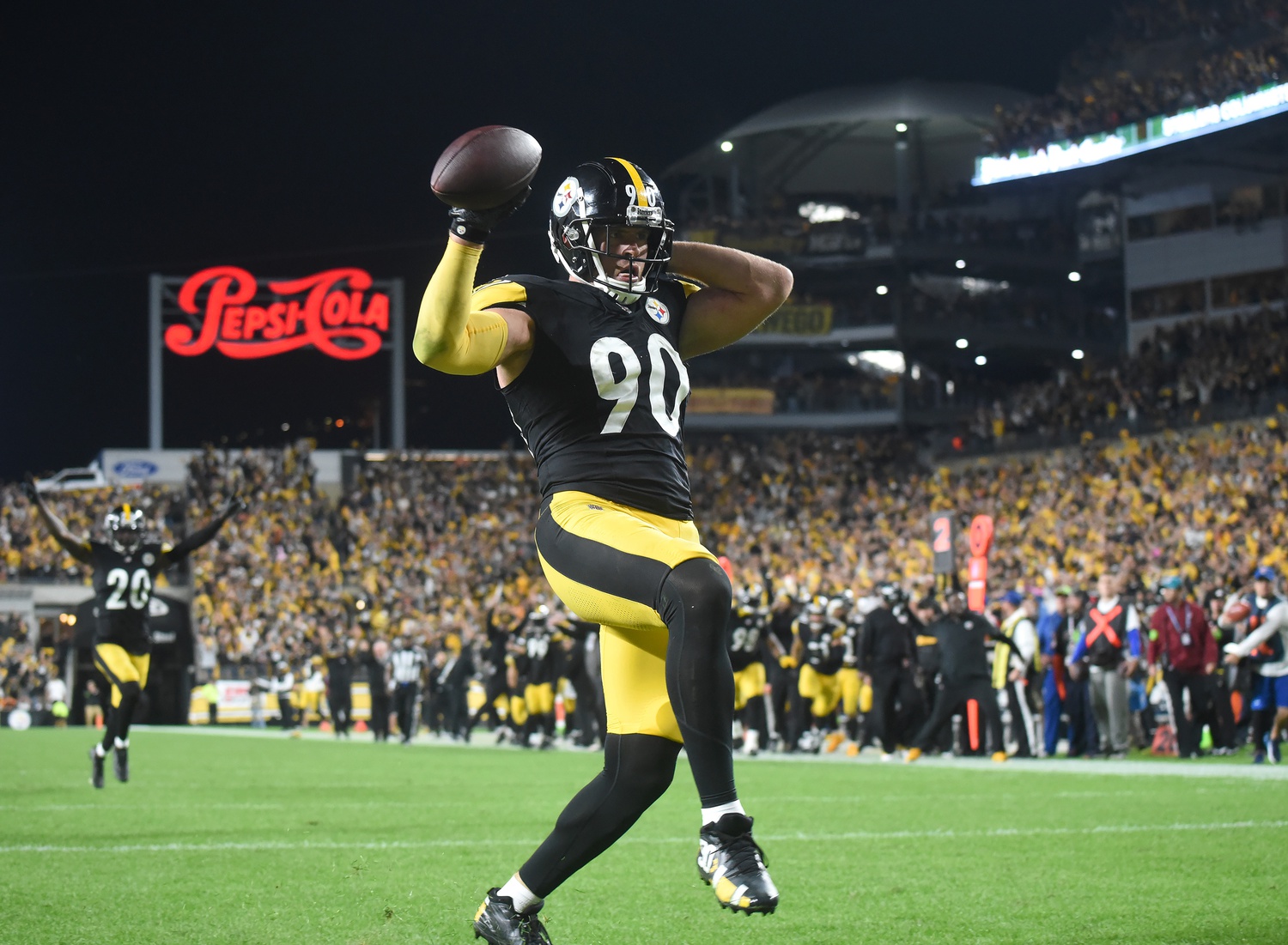 Sep 18, 2023; Pittsburgh, Pennsylvania, USA; Pittsburgh Steelers linebacker T.J. Watt (90) heads into the endzone for a touchdown after recovering a fumble in the fourth quarter against the Cleveland Browns at Acrisure Stadium. The score put the Steelers ahead as they won 26-22.