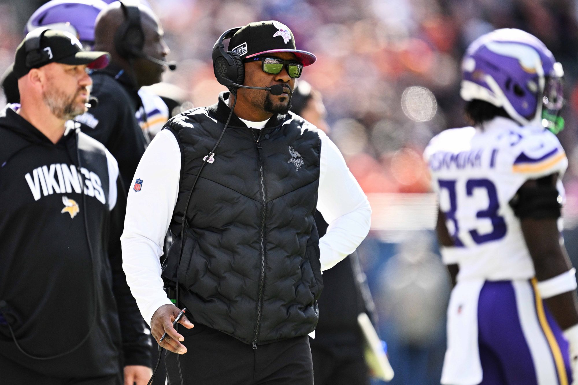 Oct 15, 2023; Chicago, Illinois, USA; Minnesota Vikings defensive coordinator Brian Flores watches his team play against the Chicago Bears at Soldier Field.