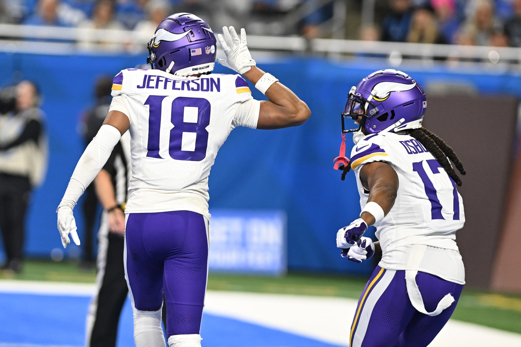 Jan 7, 2024; Detroit, Michigan, USA; Minnesota Vikings wide receiver Justin Jefferson (18) celebrates with wide receiver K.J. Osborn (17) after scoring a touchdown against the Detroit Lions in the third quarter at Ford Field.