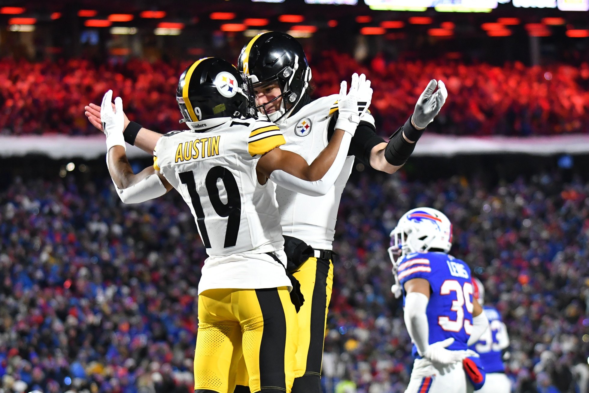 Jan 15, 2024; Orchard Park, New York, USA; Pittsburgh Steelers wide receiver Calvin Austin III (19) celebrates a touchdown in the second half against the Buffalo Bills in a 2024 AFC wild card game at Highmark Stadium.