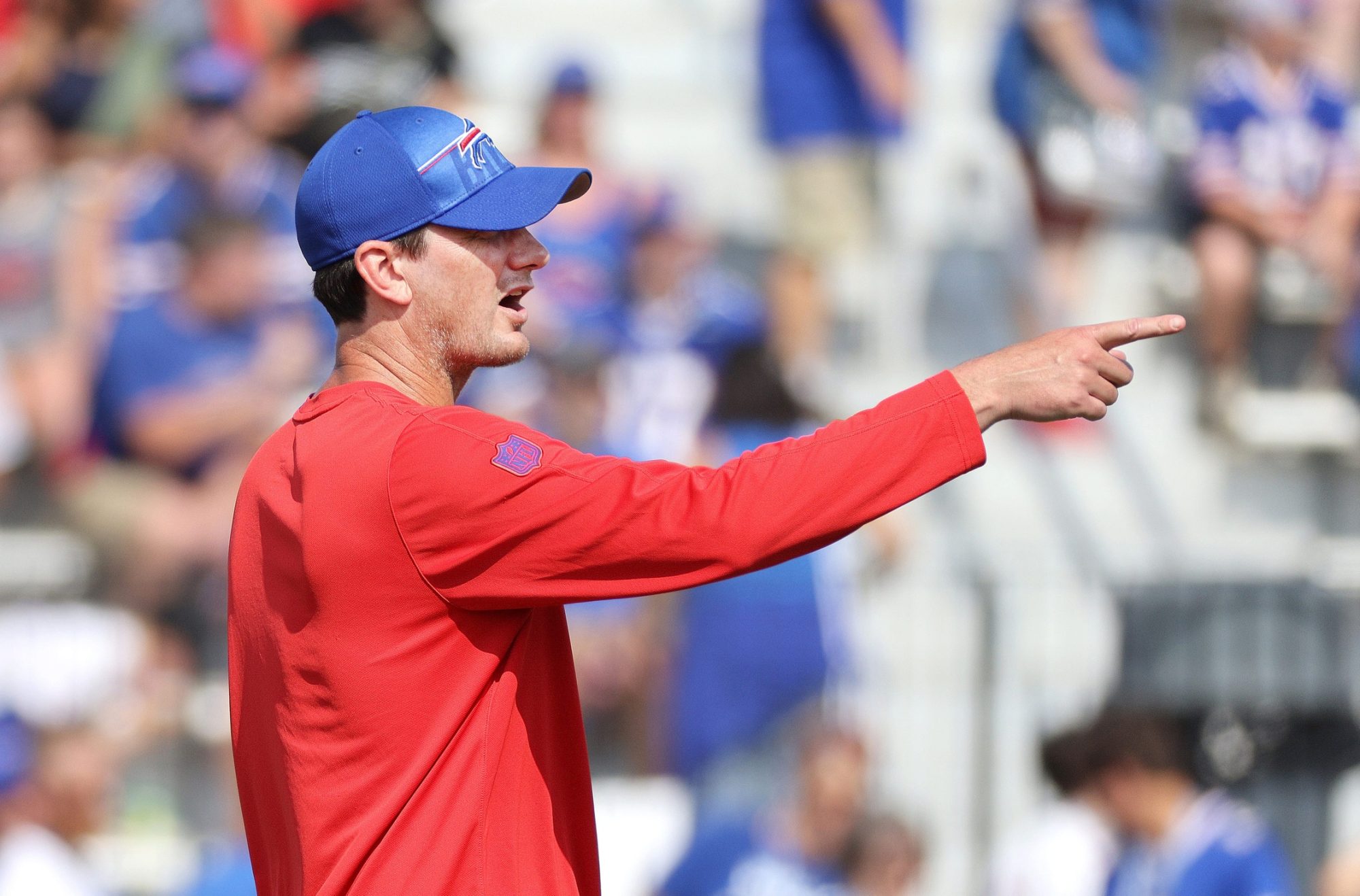 Bills offensive coordinator Ken Dorsey the the play right during practice