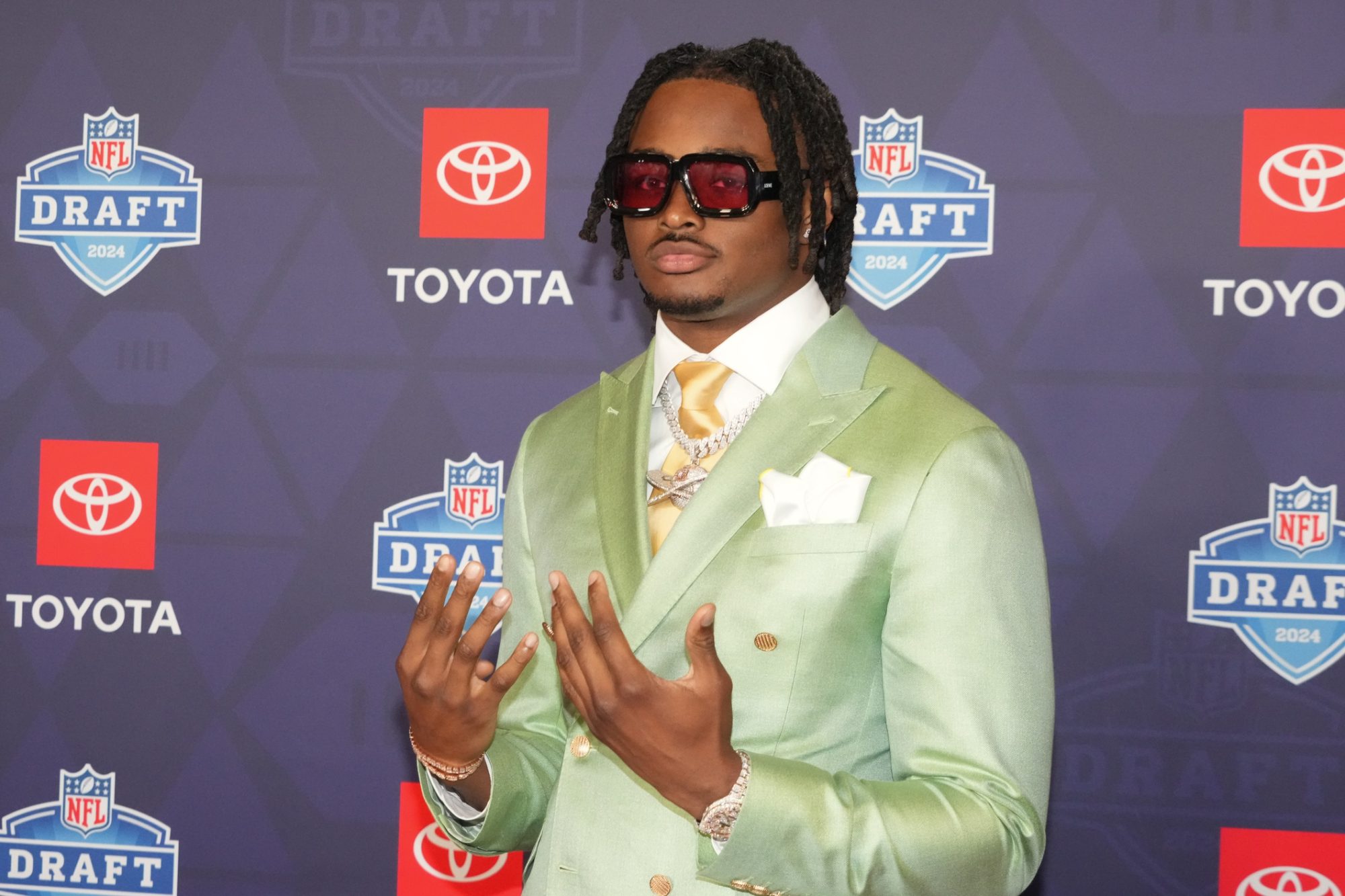 Apr 25, 2024; Detroit, MI, USA; Alabama Crimson Tide linebacker Dallas Turner stands on the red carpet ahead of the 2024 NFL Draft at Detroit’s Fox Theatre.