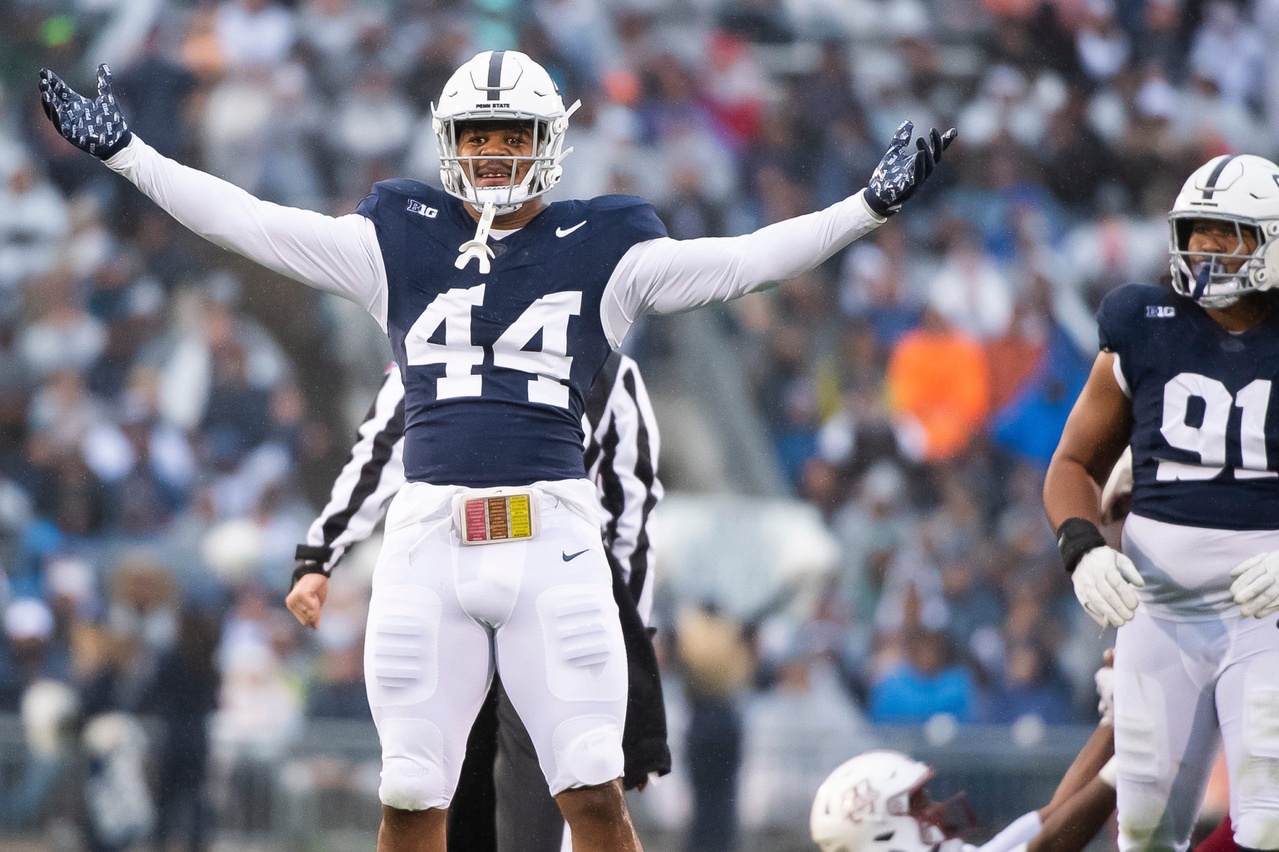 Penn State edge rusher Chop Robinson celebrates on the field.