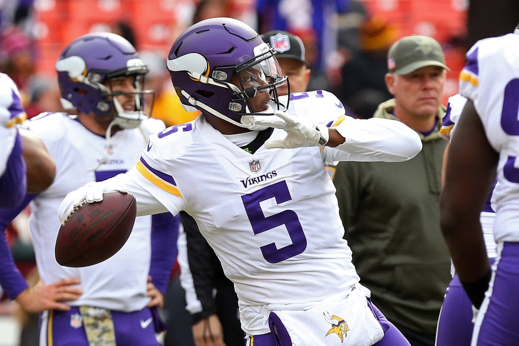 Nov 12, 2017; Landover, MD, USA; Minnesota Vikings quarterback Teddy Bridgewater (5) passes the ball during warm ups prior to the Vikings' game against the Washington Redskins at FedEx Field.