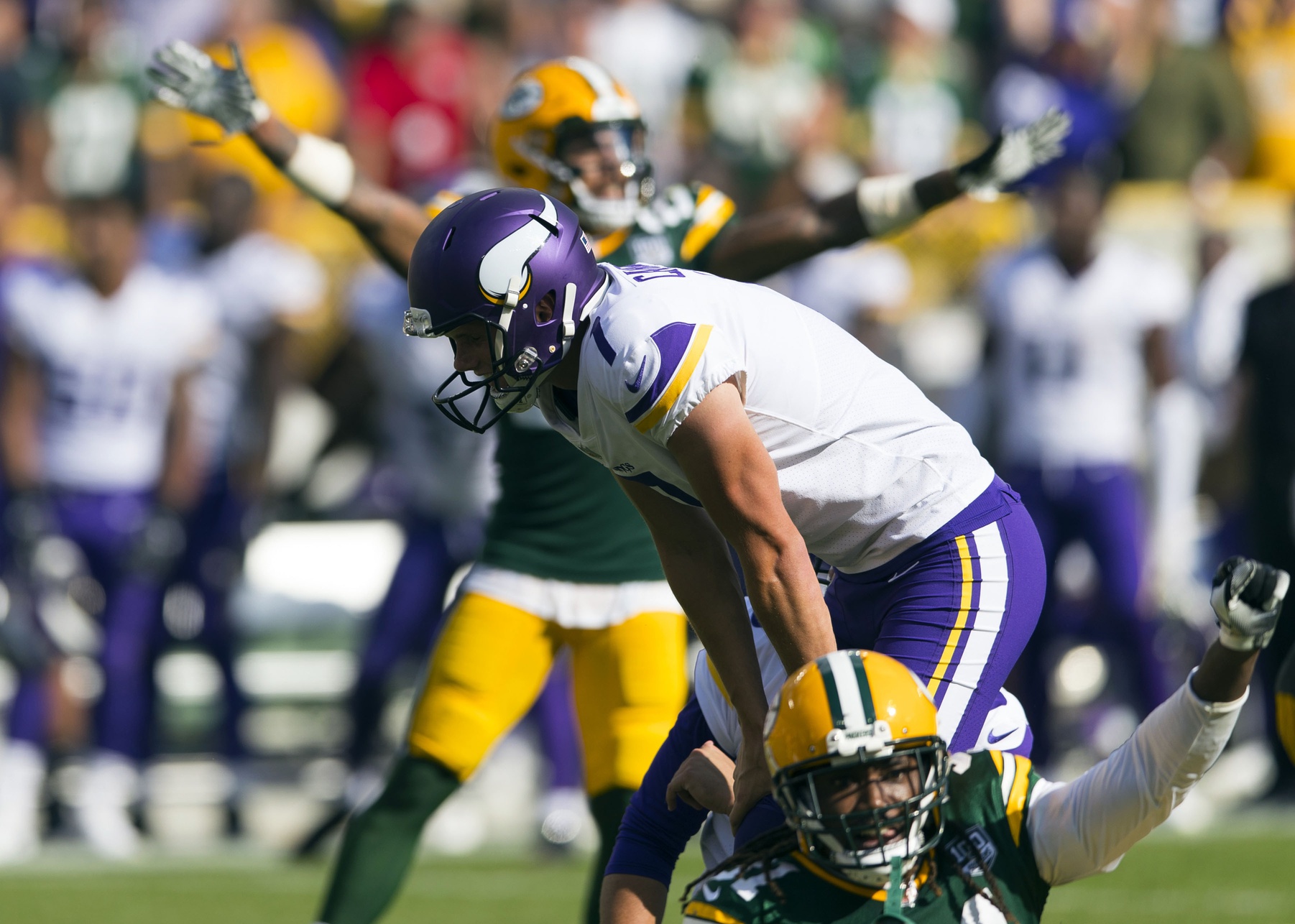 Sep 16, 2018; Green Bay, WI, USA; Minnesota Vikings kicker Daniel Carlson (7) reacts after missing a game winning field goal as time expires during overtime against the Green Bay Packers at Lambeau Field.