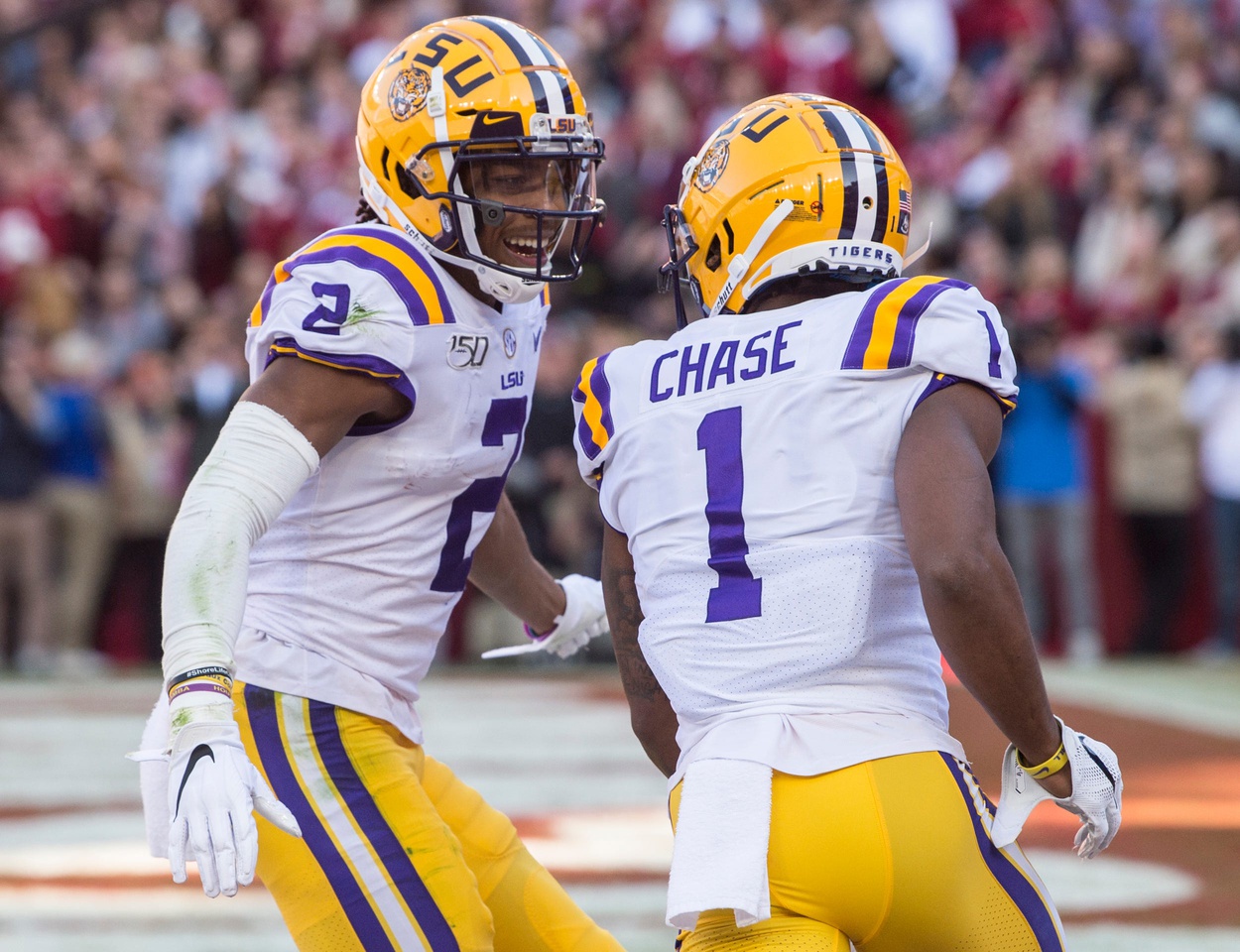 LSU wide receiver Justin Jefferson (2) and LSU wide receiver Ja'Marr Chase (1) celebrate Chase's touchdown catch at Bryant-Denny Stadium in Tuscaloosa, Ala., on Saturday, Nov. 9, 2019.