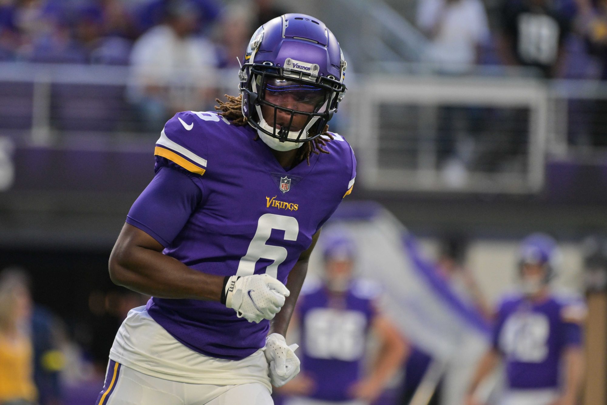 Aug 20, 2022; Minneapolis, Minnesota, USA; Minnesota Vikings safety Lewis Cine (6) warms up before the game against the San Francisco 49ers at U.S. Bank Stadium.