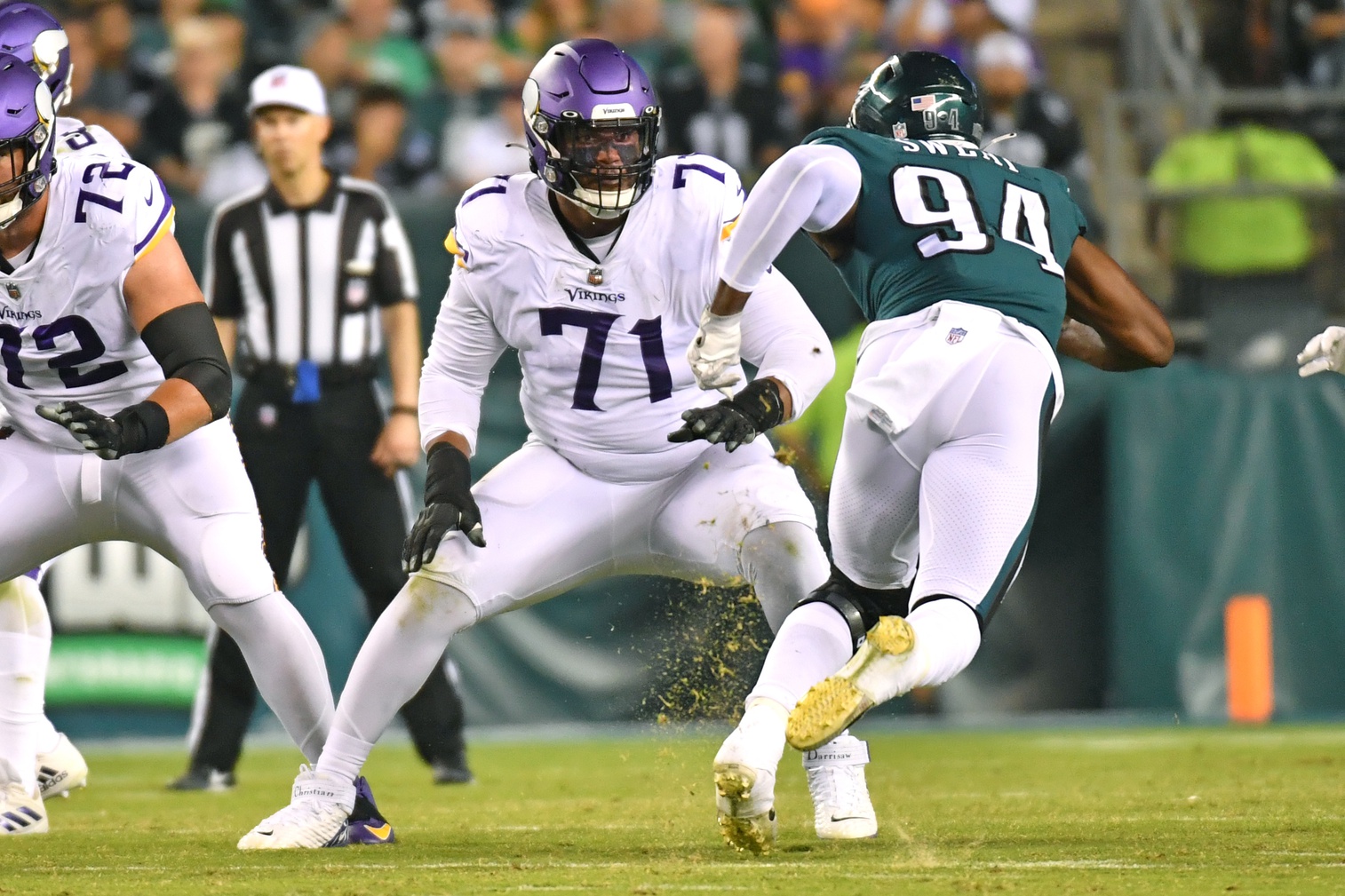 Sep 19, 2022; Philadelphia, Pennsylvania, USA; Minnesota Vikings offensive tackle Christian Darrisaw (71) blocks Philadelphia Eagles defensive end Josh Sweat (94) at Lincoln Financial Field.