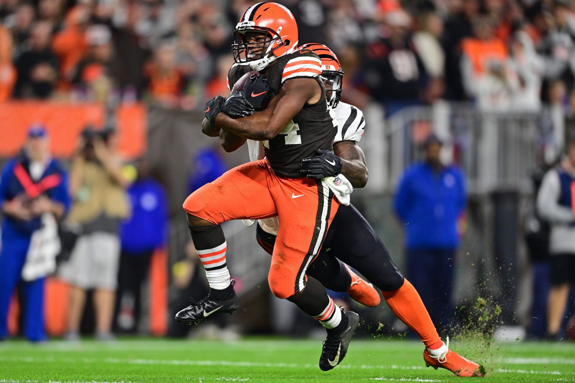 Oct 31, 2022; Cleveland, Ohio, USA; Cleveland Browns running back Nick Chubb (24) runs through Cincinnati Bengals linebacker Germaine Pratt (57) to score a touchdown in the fourth quarter at FirstEnergy Stadium.