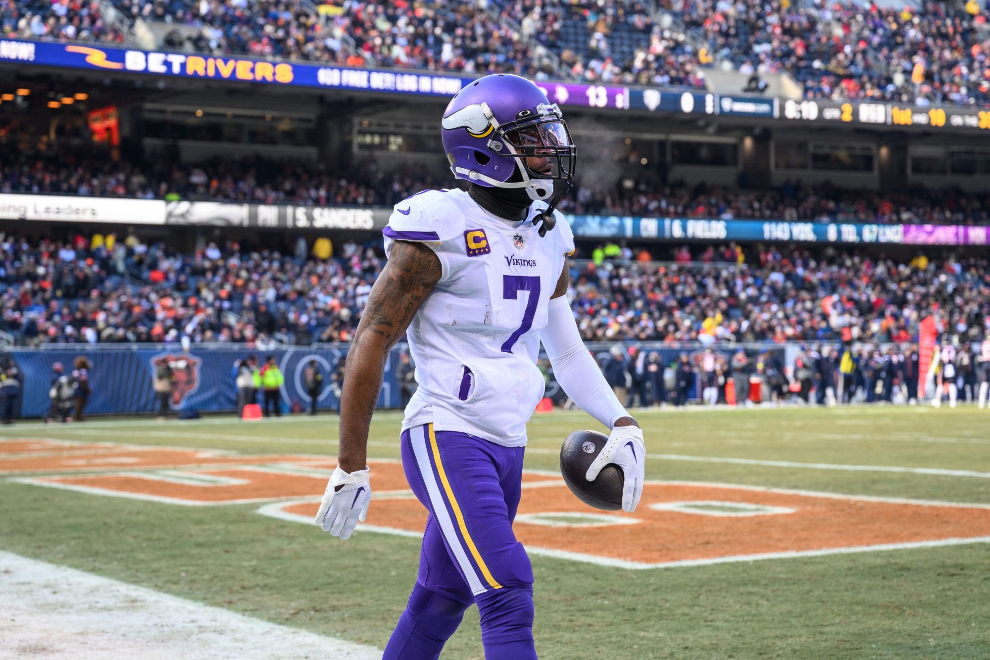 Jan 8, 2023; Chicago, Illinois, USA; Minnesota Vikings cornerback Patrick Peterson (7) celebrates his interception during the second quarter against the Chicago Bears at Soldier Field.