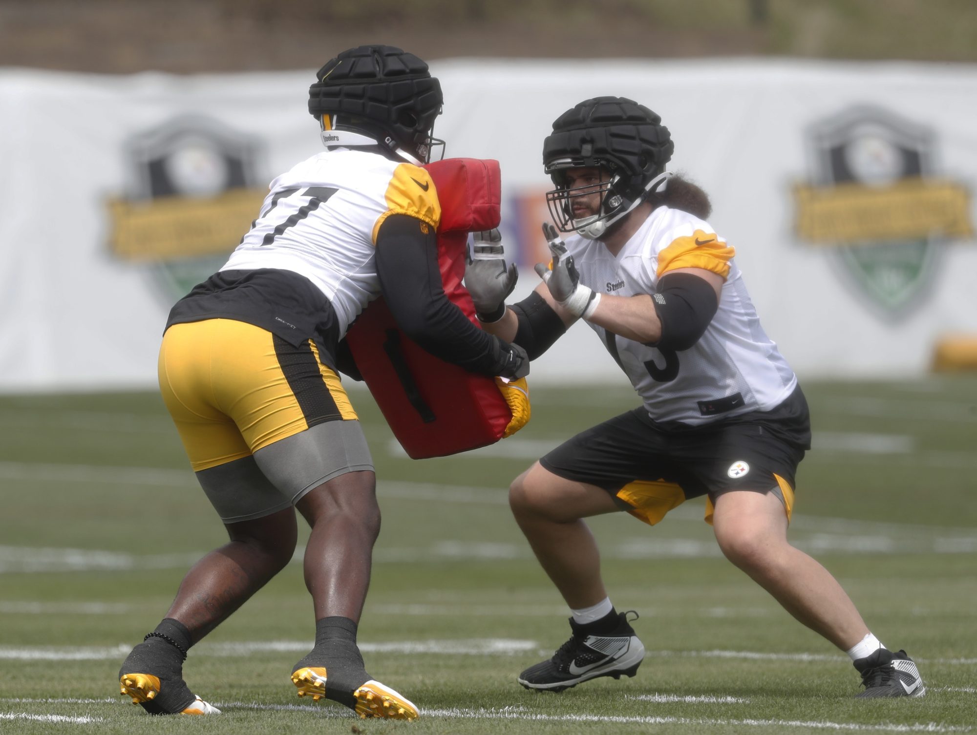 Jul 27, 2023; Latrobe, PA, USA; Pittsburgh Steelers guard Isaac Seumalo (73) works against offensive tackle Broderick Jones (77) in drills during training camp at Saint Vincent College.