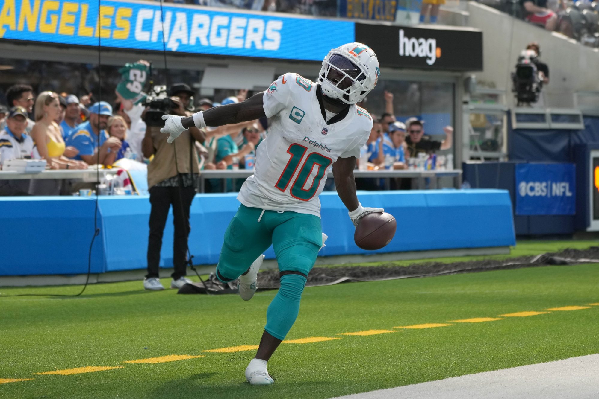 Sep 10, 2023; Inglewood, California, USA; Miami Dolphins wide receiver Tyreek Hill (10) celebrates after catching a 35-yard touchdown pass in the third quarter against the Miami Dolphins at SoFi Stadium.