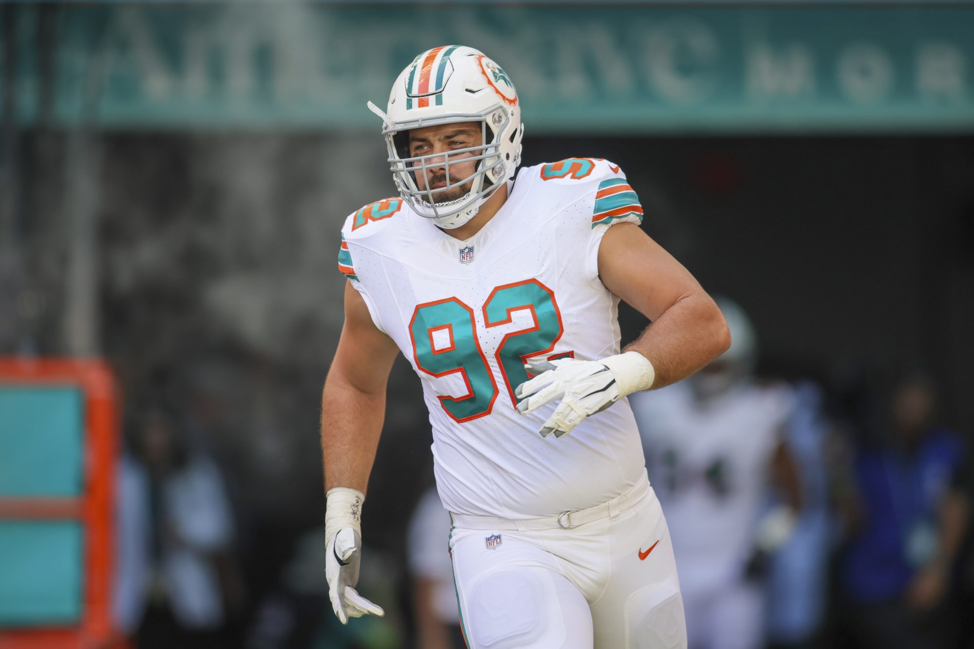 Oct 29, 2023; Miami Gardens, Florida, USA; Miami Dolphins defensive tackle Zach Sieler (92) takes on the field prior to the game against the New England Patriots at Hard Rock Stadium.