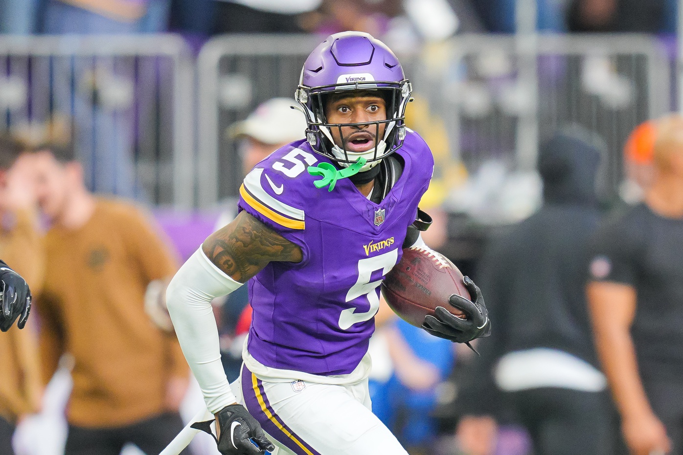 Nov 12, 2023; Minneapolis, Minnesota, USA; Minnesota Vikings cornerback Mekhi Blackmon (5) intercepts the ball against the New Orleans Saints in the fourth quarter at U.S. Bank Stadium.