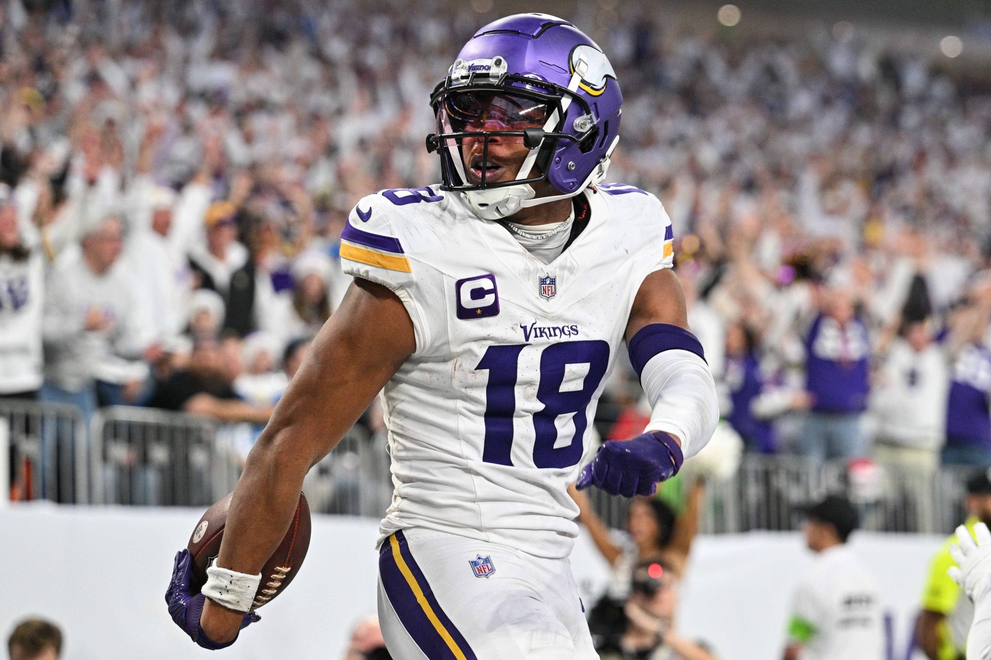 Dec 24, 2023; Minneapolis, Minnesota, USA; Minnesota Vikings wide receiver Justin Jefferson (18) reacts after scoring a touchdown during the second quarter against the Detroit Lions at U.S. Bank Stadium.