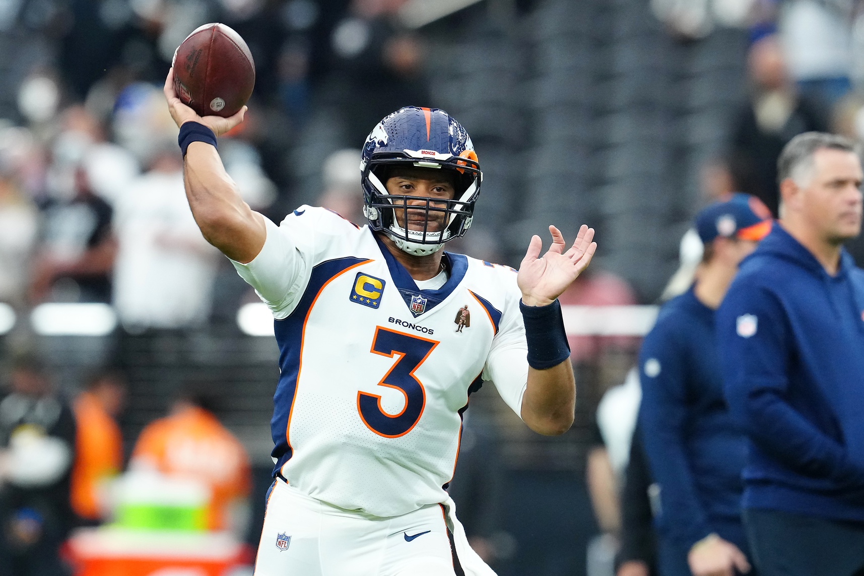 Jan 7, 2024; Paradise, Nevada, USA; Denver Broncos quarterback Russell Wilson (3) warms up before a game against the Las Vegas Raiders at Allegiant Stadium.