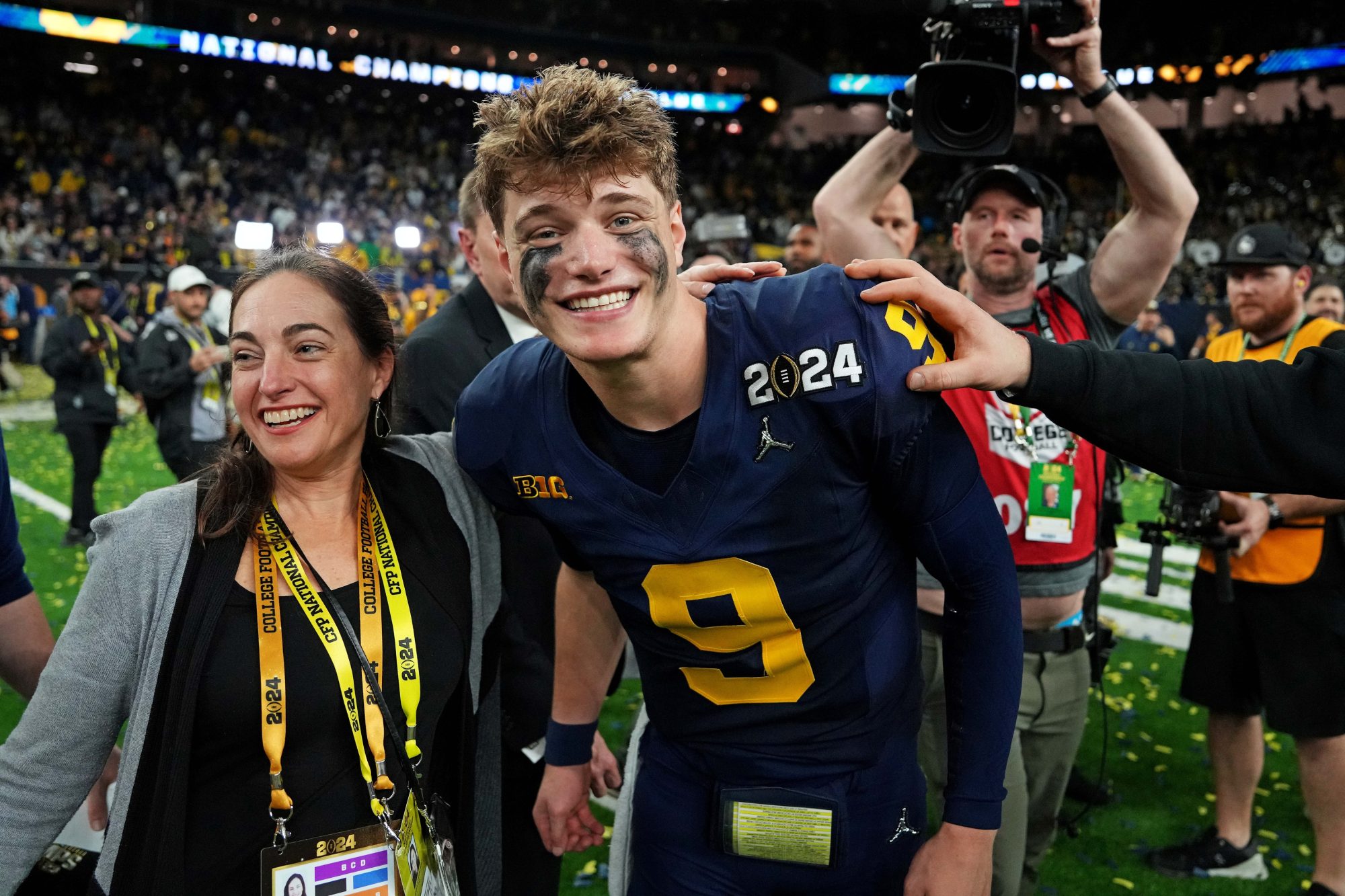 Jan 8, 2024; Houston, TX, USA; Michigan Wolverines quarterback J.J. McCarthy (9) celebrates after beating the Washington Huskies in the 2024 College Football Playoff national championship game at NRG Stadium.