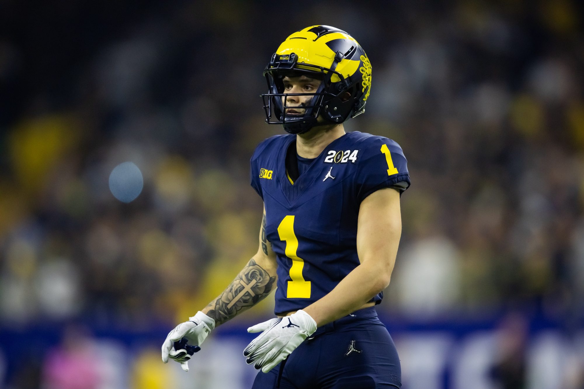 Jan 8, 2024; Houston, TX, USA; Michigan Wolverines wide receiver Roman Wilson (1) against the Washington Huskies during the 2024 College Football Playoff national championship game at NRG Stadium.