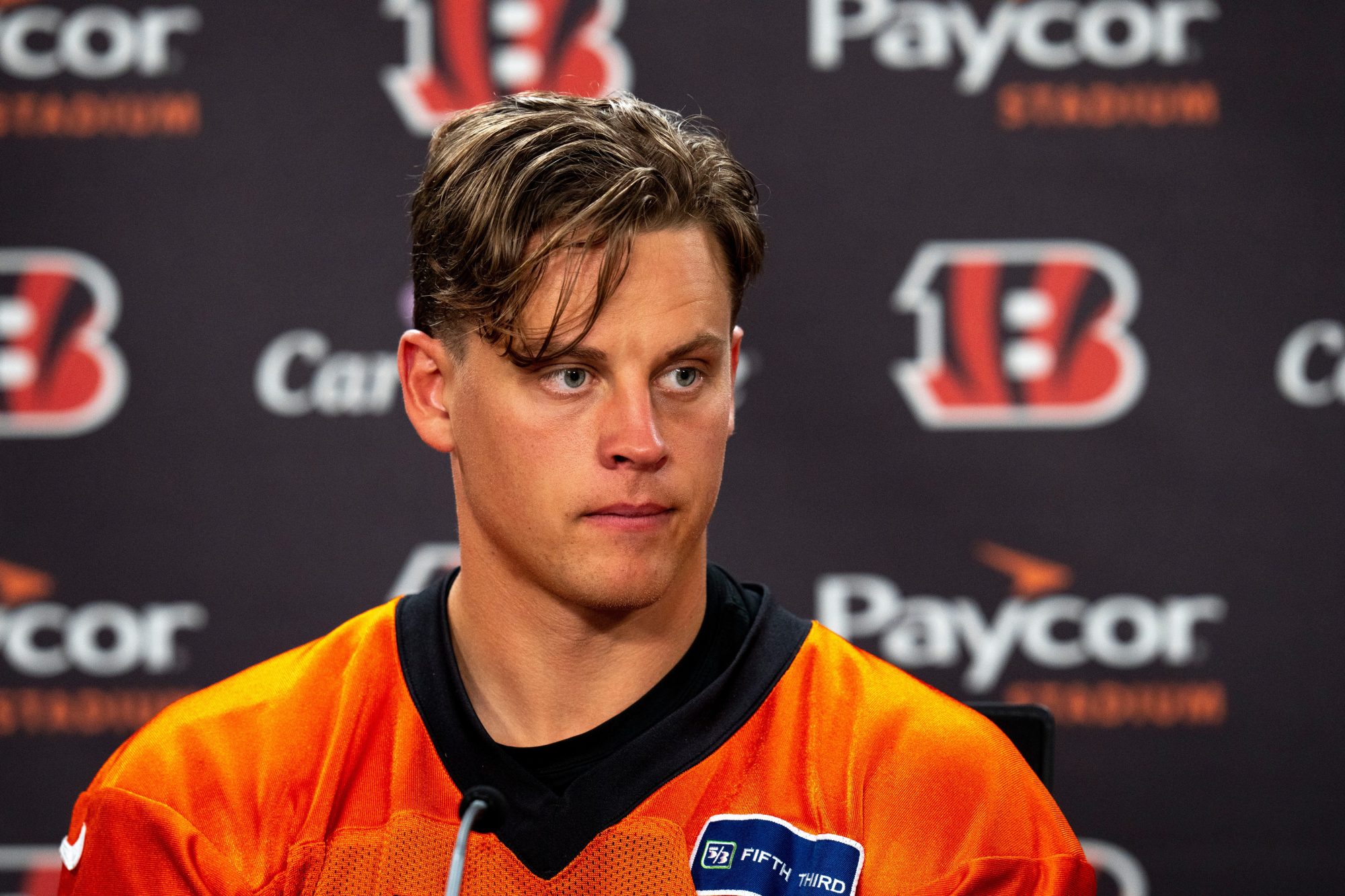 Cincinnati Bengals quarterback Joe Burrow (9) looks on during a press conference after at the IEL Indoor Facility in Cincinnati on Tuesday, June 11, 2024.