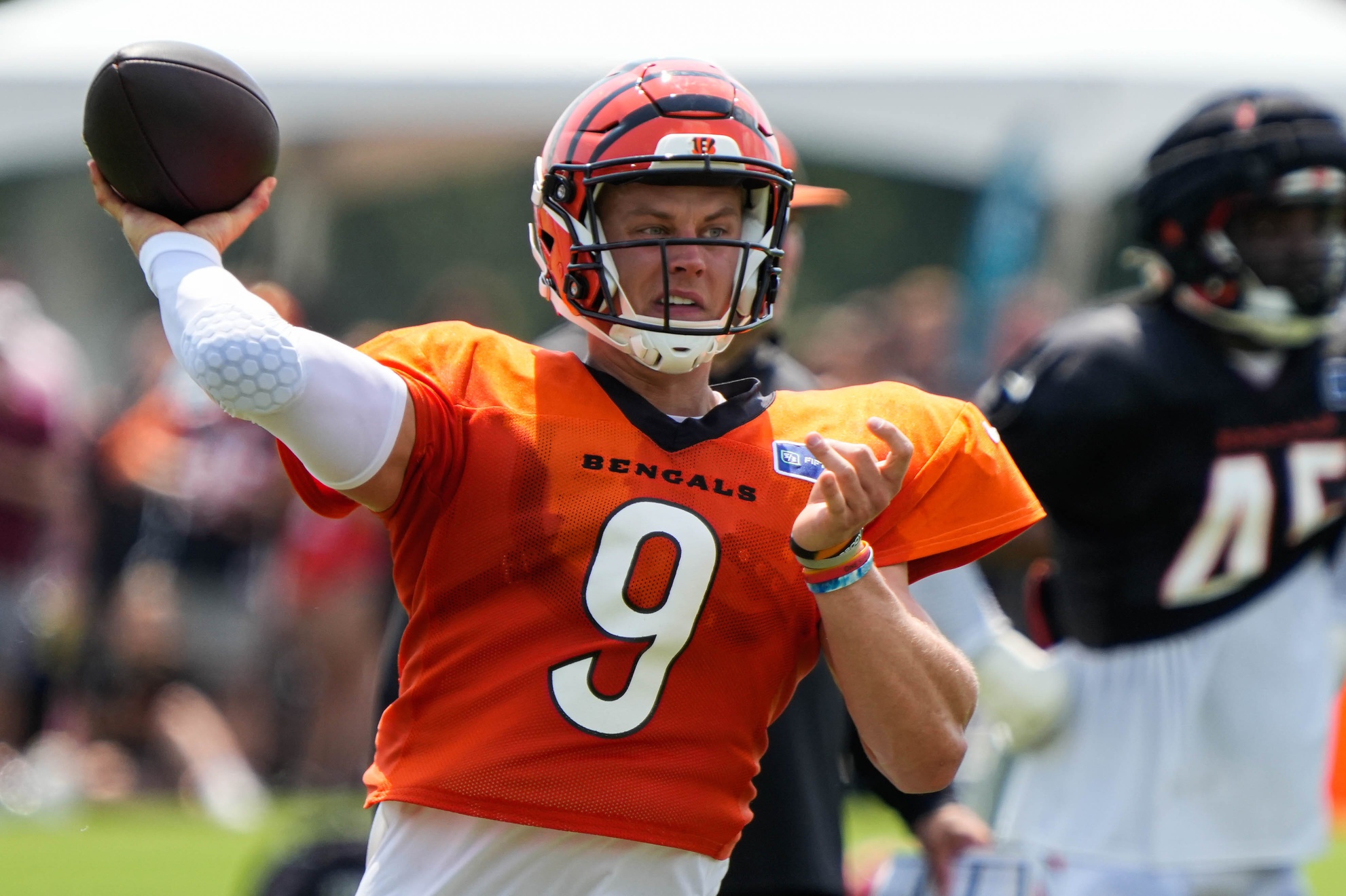 Bengals Joe Burrow winds up for a pass during their training camp on Tuesday July 30, 2024.