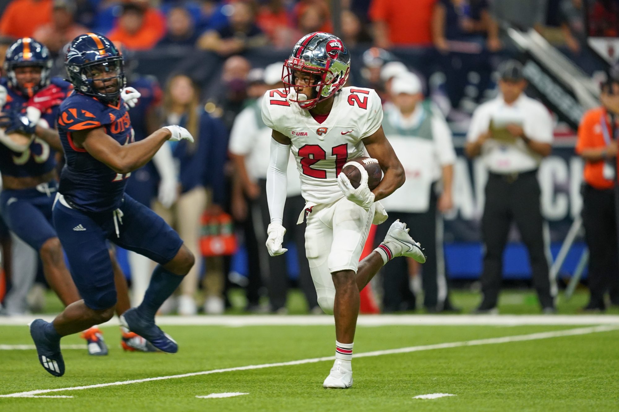 Dec 3, 2021; San Antonio, TX, USA; Western Kentucky Hilltoppers defensive back Beanie Bishop (21) returns a kick during the first half of the 2021 Conference USA Championship Game against the UTSA Roadrunners at the Alamodome.