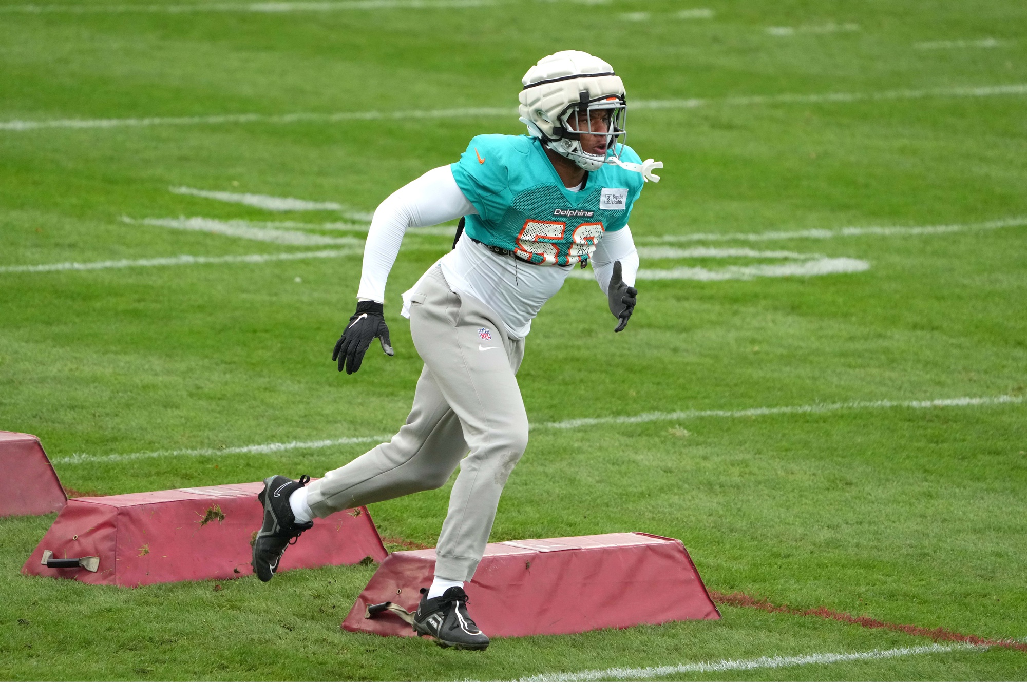 Nov 2, 2023; Frankfurt, Germany; Miami Dolphins linebacker Quinton Bell (56) during practice at the PSD Bank Arena.