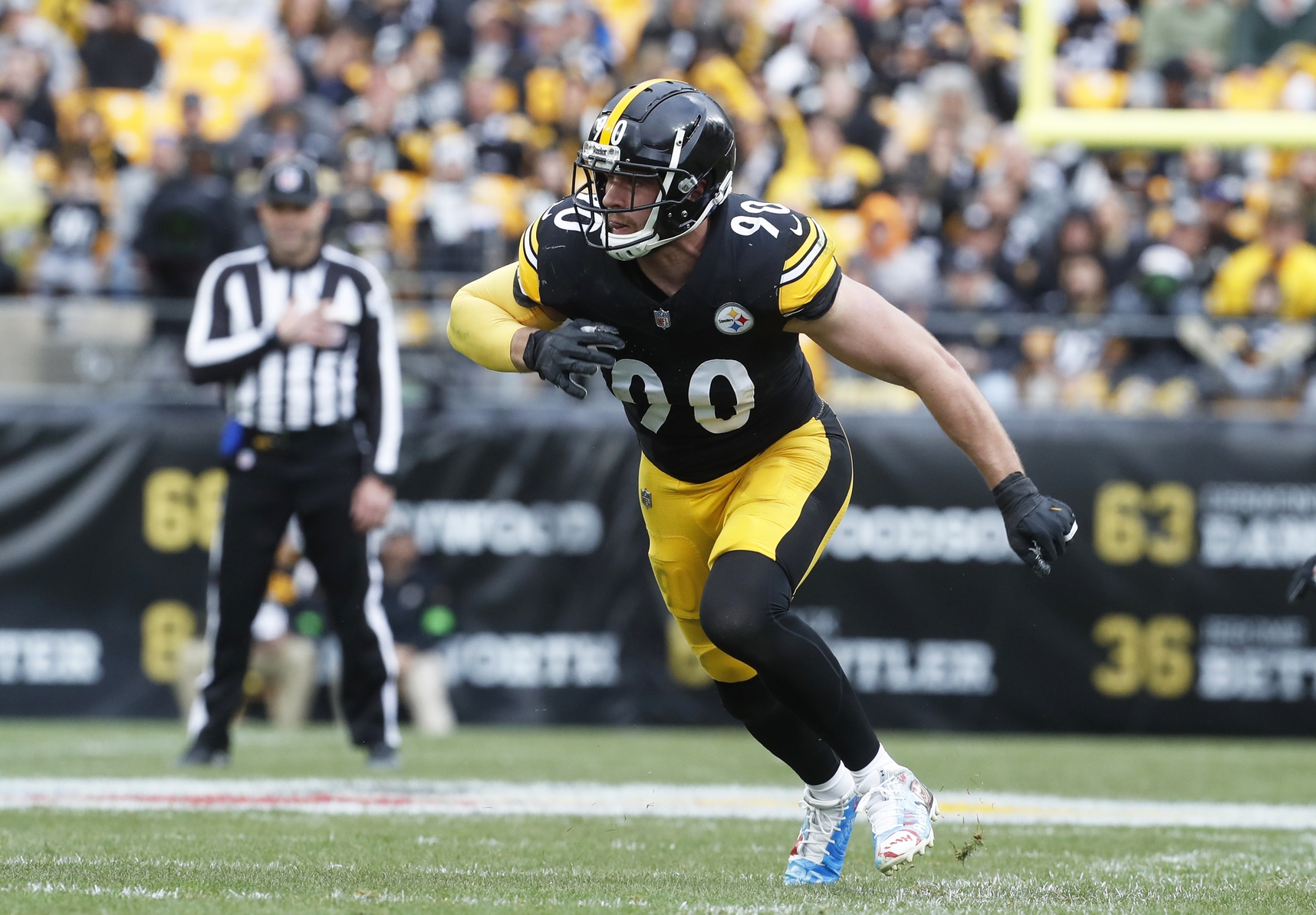 Dec 3, 2023; Pittsburgh, Pennsylvania, USA; Pittsburgh Steelers linebacker T.J. Watt (90) pass rushes at the line of scrimmage against the Arizona Cardinals during the second quarter at Acrisure Stadium.