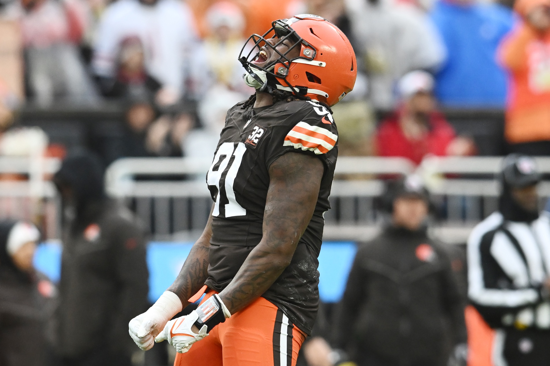 Dec 17, 2023; Cleveland, Ohio, USA; Cleveland Browns defensive end Alex Wright (91) celebrates after a play during the first quarter against the Chicago Bears at Cleveland Browns Stadium.