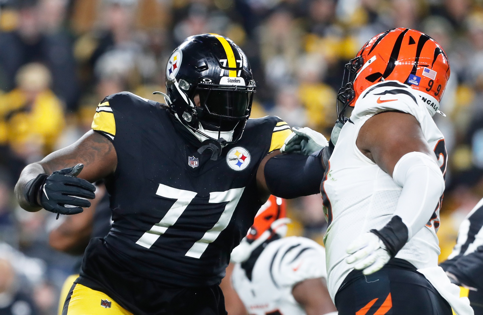 Dec 23, 2023; Pittsburgh, Pennsylvania, USA; Pittsburgh Steelers offensive tackle Broderick Jones (77) blocks at the line of scrimmage against Cincinnati Bengals defensive end Myles Murphy (right) during the second quarter at Acrisure Stadium.