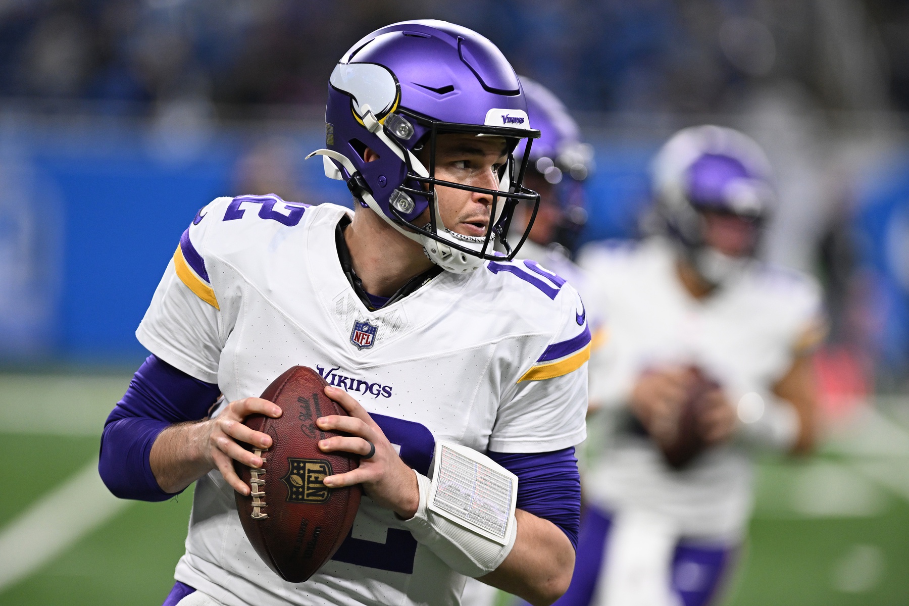 Jan 7, 2024; Detroit, Michigan, USA; Minnesota Vikings quarterback Nick Mullens (12) warms up prior to his game against the Detroit Lions at Ford Field.