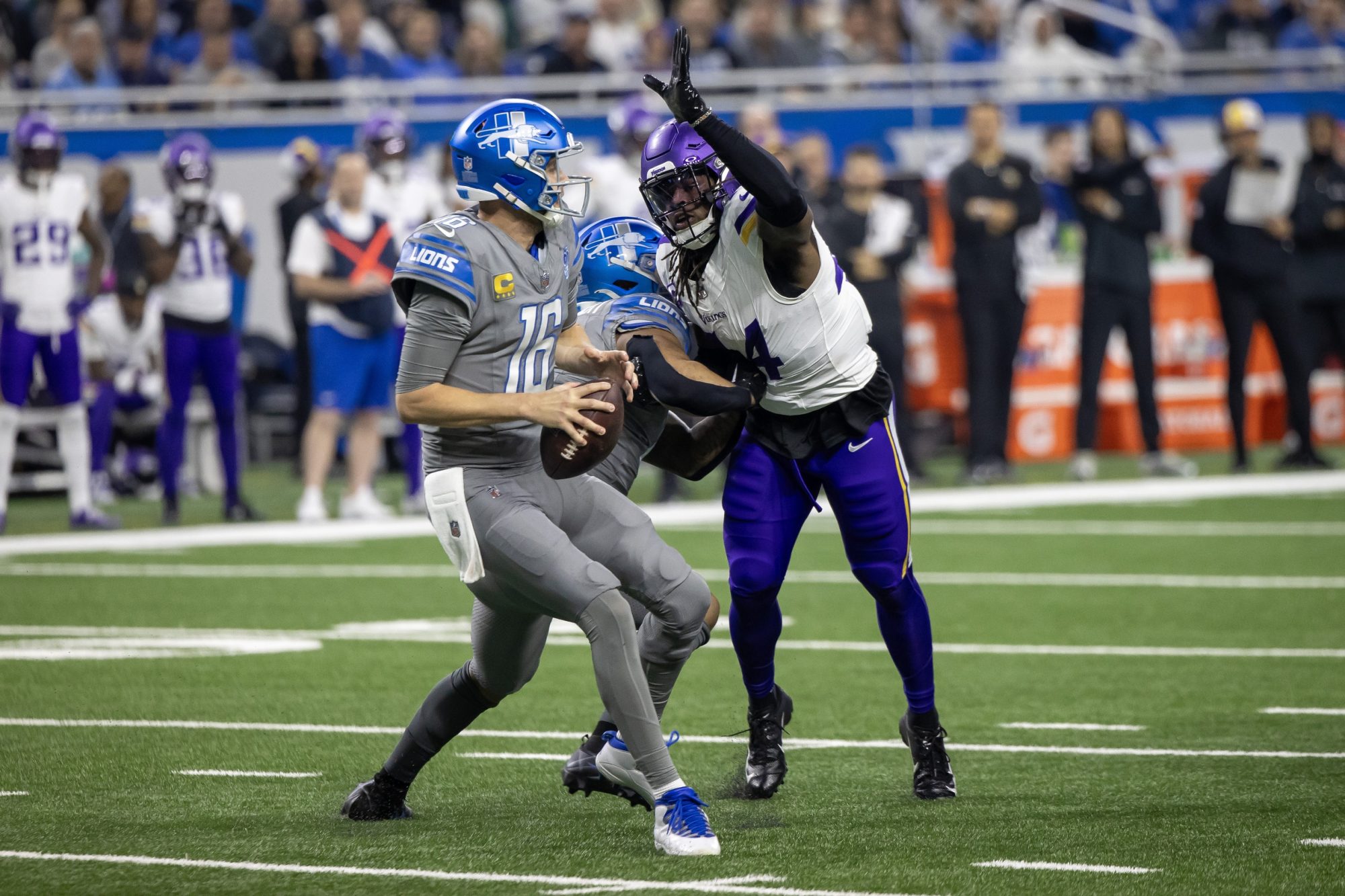 Jan 7, 2024; Detroit, Michigan, USA; Minnesota Vikings safety Josh Metellus (44) pressures Detroit Lions quarterback Jared Goff (16) during first quarter at Ford Field.