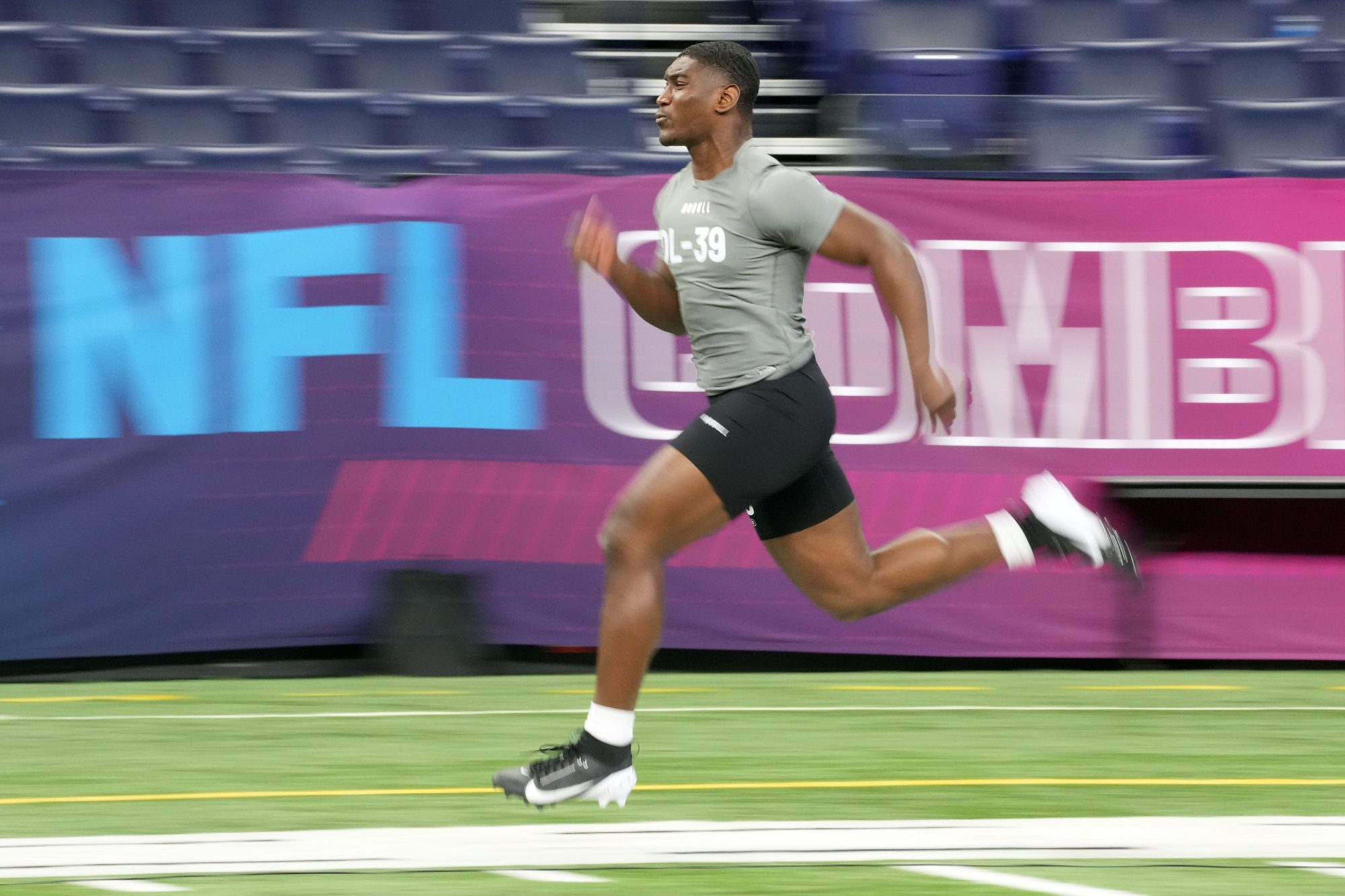 Feb 29, 2024; Indianapolis, IN, USA; Mississippi defensive lineman Cedric Johnson (DL39) works out during the 2024 NFL Combine at Lucas Oil Stadium.