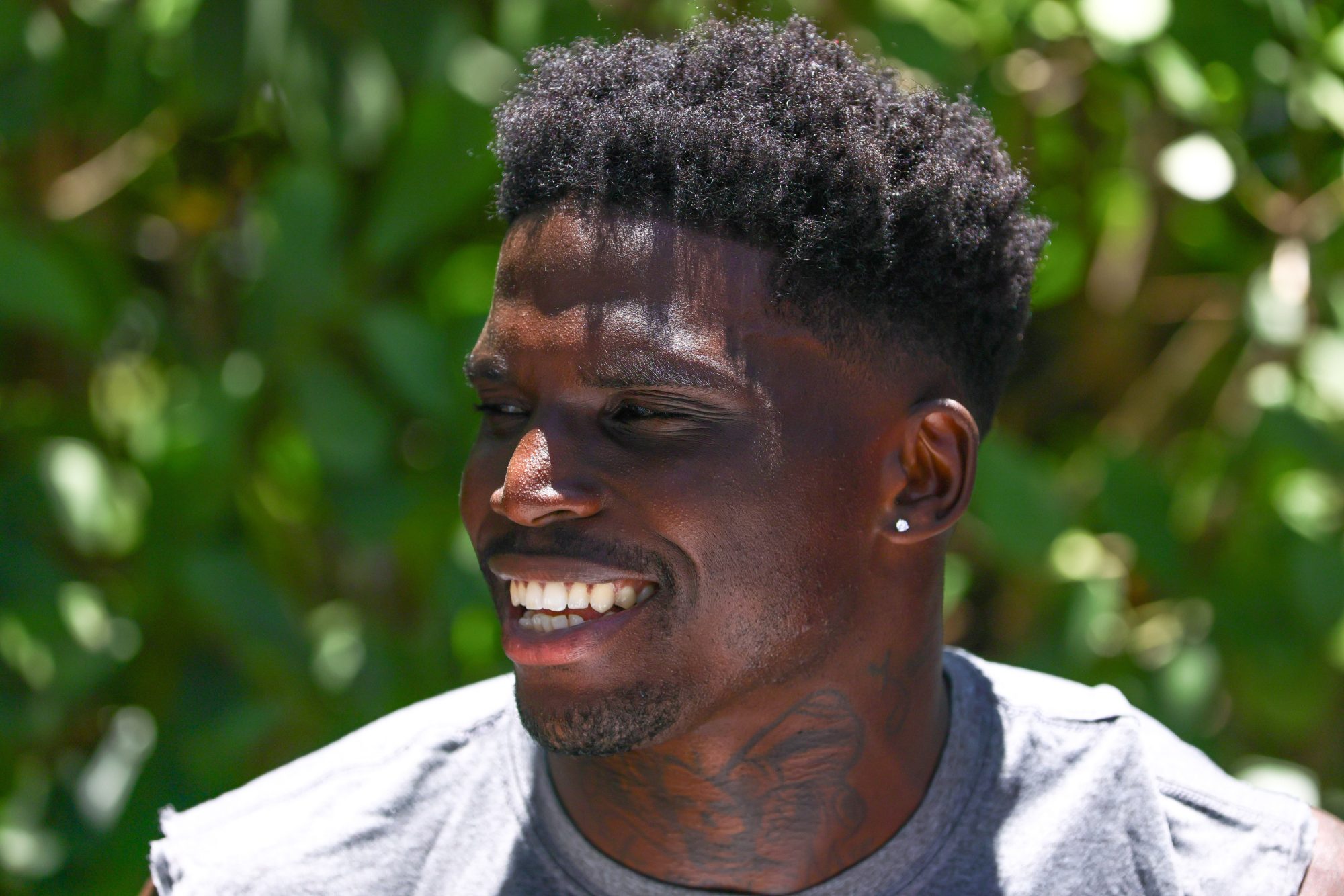 Jun 4, 2024; Miami Gardens, FL, USA; Miami Dolphins wide receiver Tyreek Hill (10) speaks to reporters during mandatory minicamp at Baptist Health Training Complex.