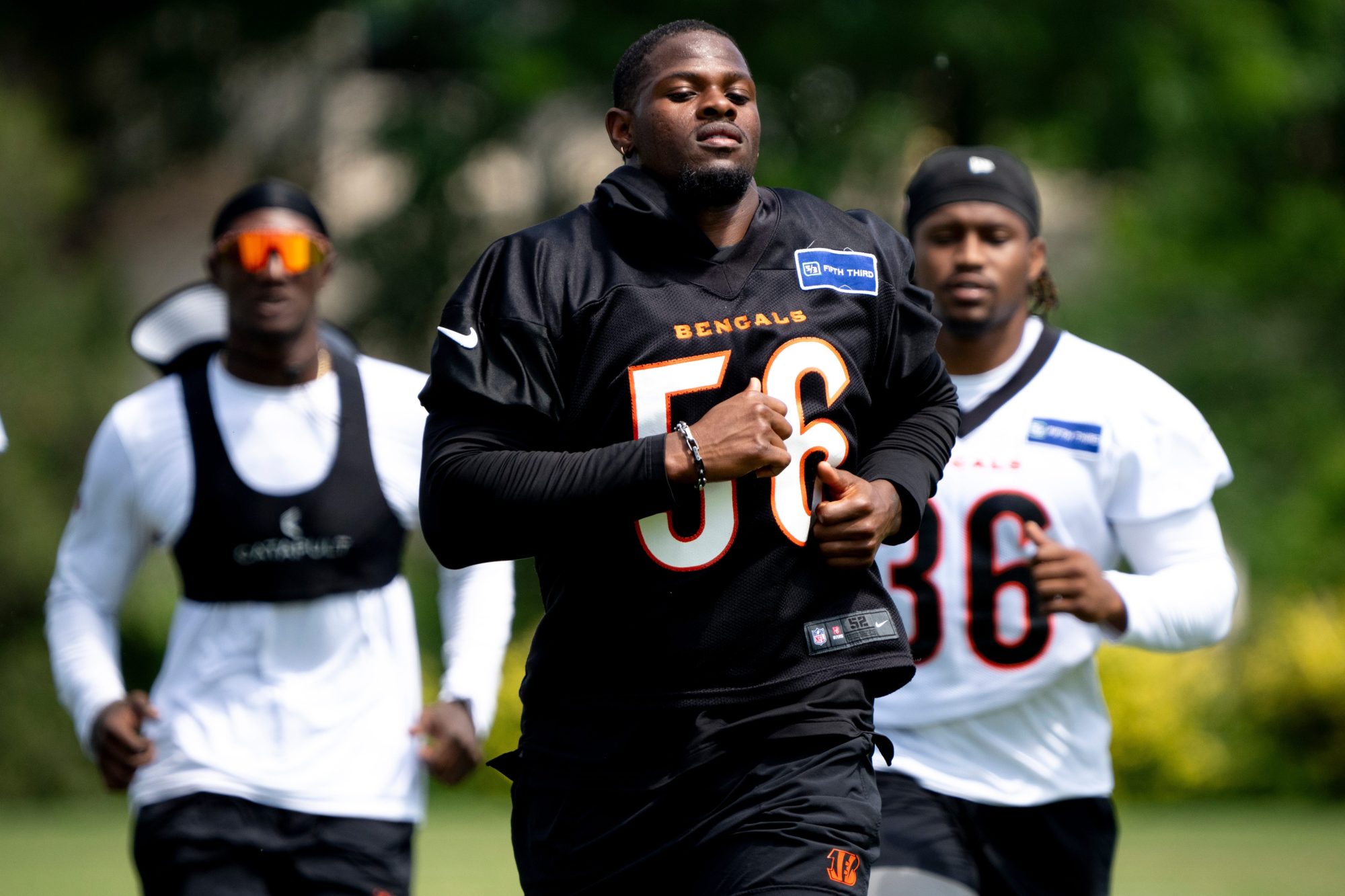 Cincinnati Bengals linebacker Devin Harper (56) runs at the Bengals NFL practice in Cincinnati on Tuesday, June 4, 2024.