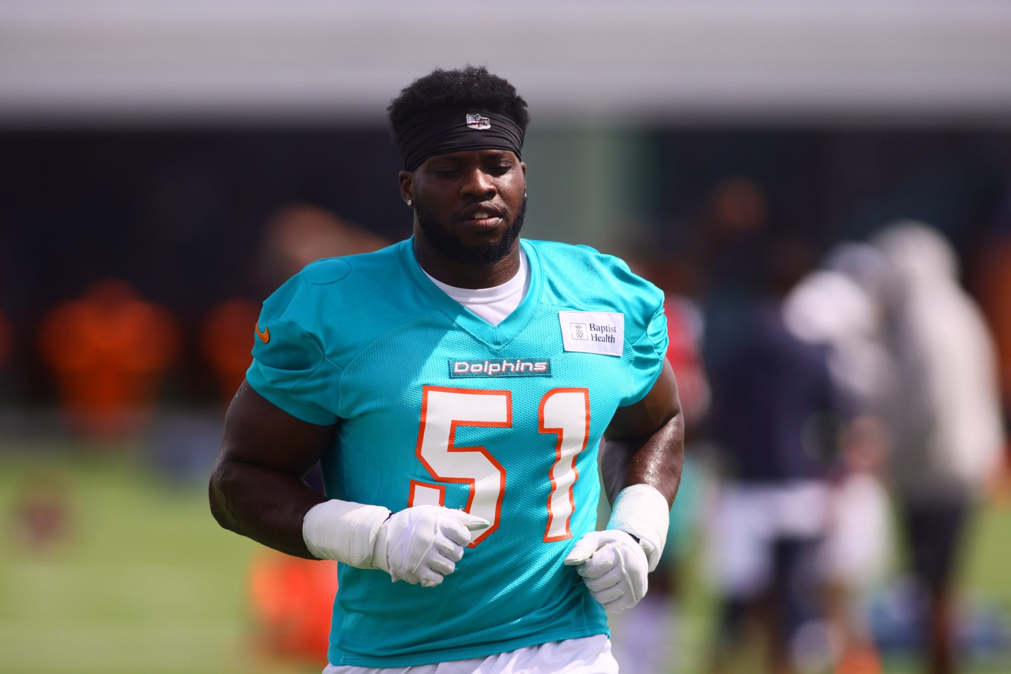 Jul 28, 2024; Miami Gardens, FL, USA; Miami Dolphins linebacker Emmanuel Ogbah (51) works out during training camp at Baptist Health Training Complex.