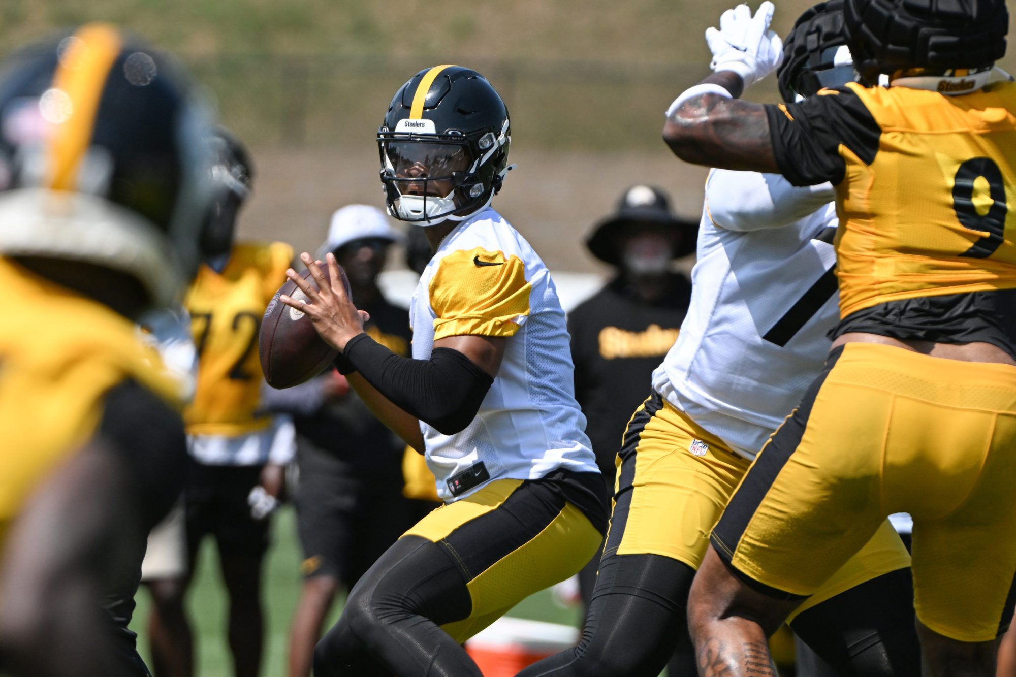 Jul 28, 2024; Latrobe, PA, USA; Pittsburgh Steelers quarterback Justin Fields participates in drills during training camp at Saint Vincent College.