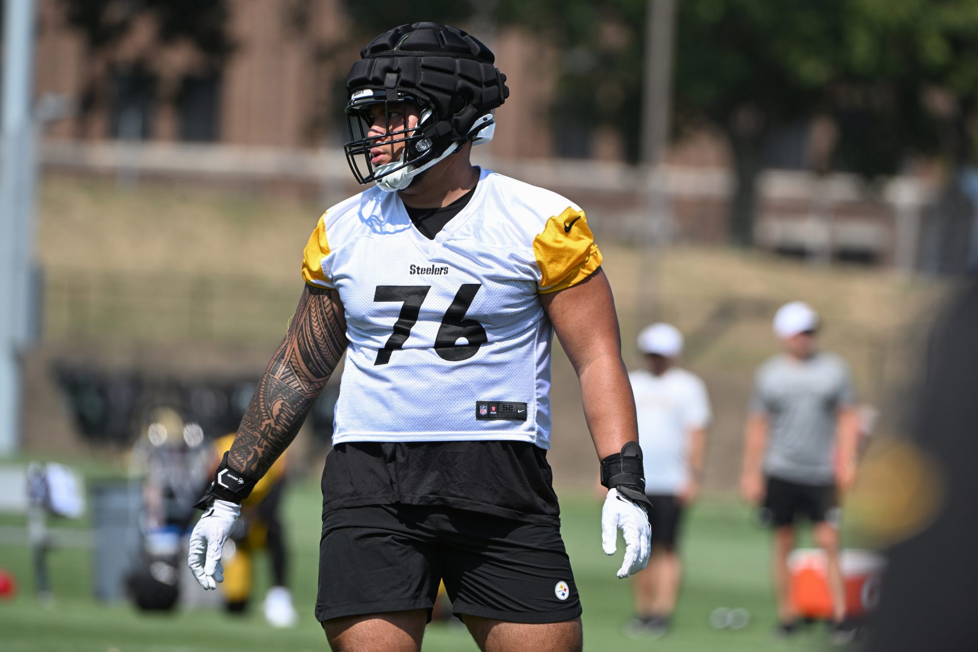 Jul 28, 2024; Latrobe, PA, USA; Pittsburgh Steelers offensive tackle Troy Fautanu (76) participates in drills during training camp at Saint Vincent College.