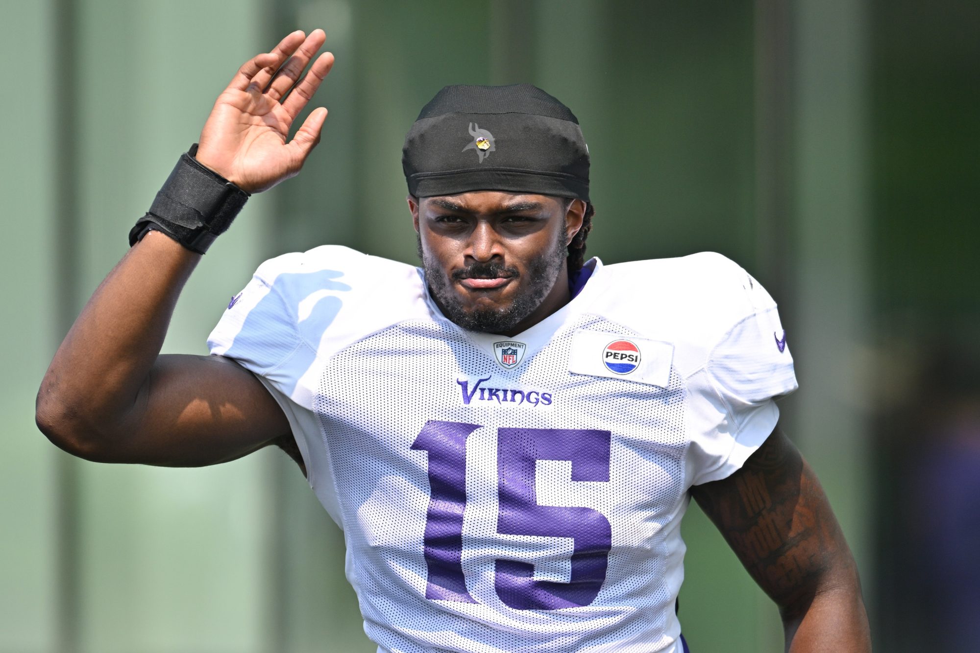 Aug 3, 2024; Eagan, MN, USA; Minnesota Vikings linebacker Dallas Turner (15) warms up during practice at Vikings training camp in Eagan, MN.