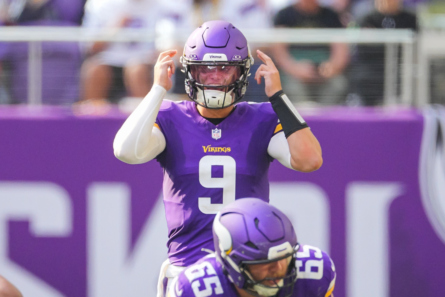 Aug 10, 2024; Minneapolis, Minnesota, USA; Minnesota Vikings quarterback J.J. McCarthy (9) under center against the Las Vegas Raiders in the third quarter at U.S. Bank Stadium.