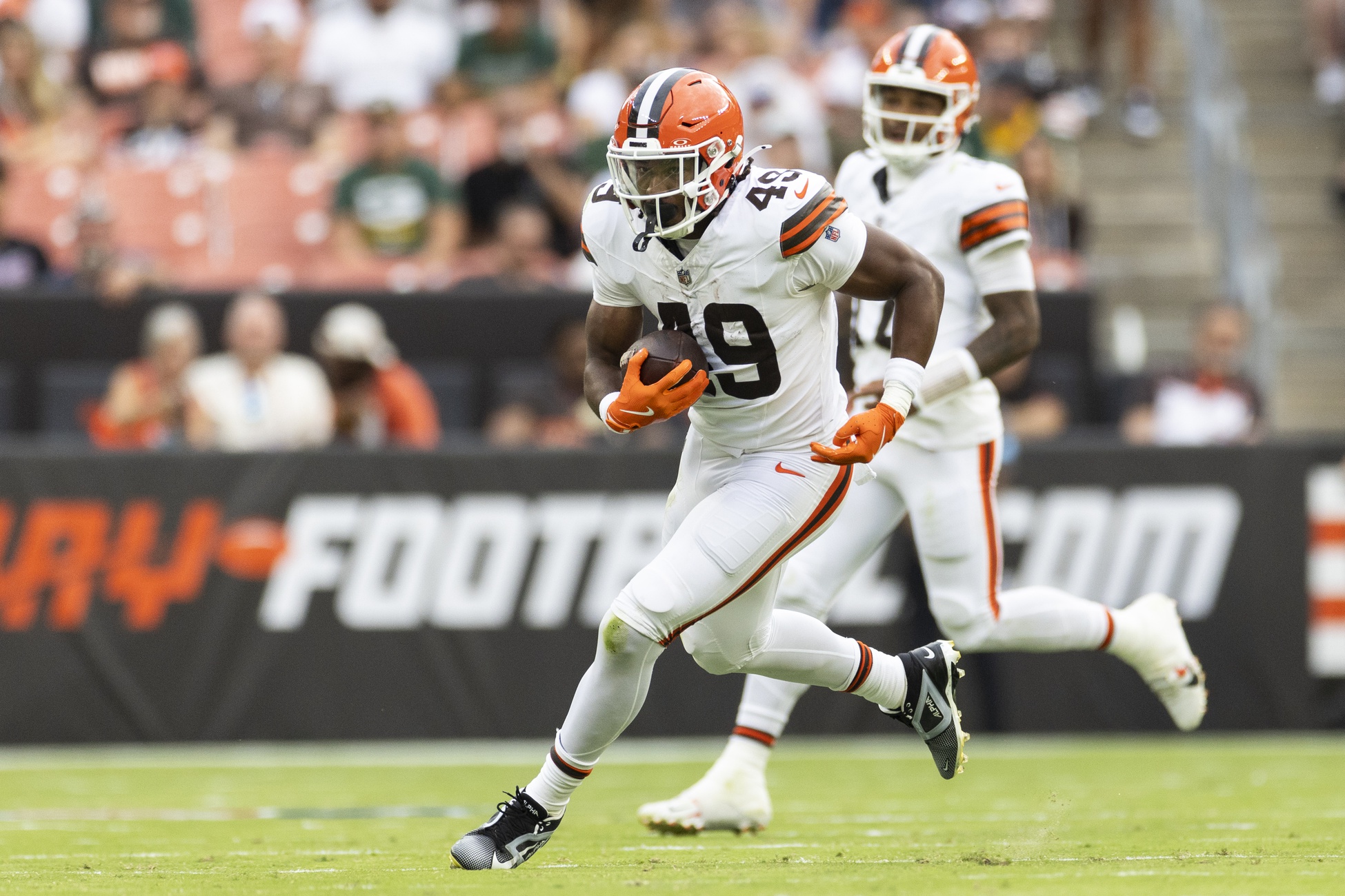 Aug 10, 2024; Cleveland, Ohio, USA; Cleveland Browns running back Aidan Robbins (49) runs the ball against the Green Bay Packers during the fourth quarter at Cleveland Browns Stadium.