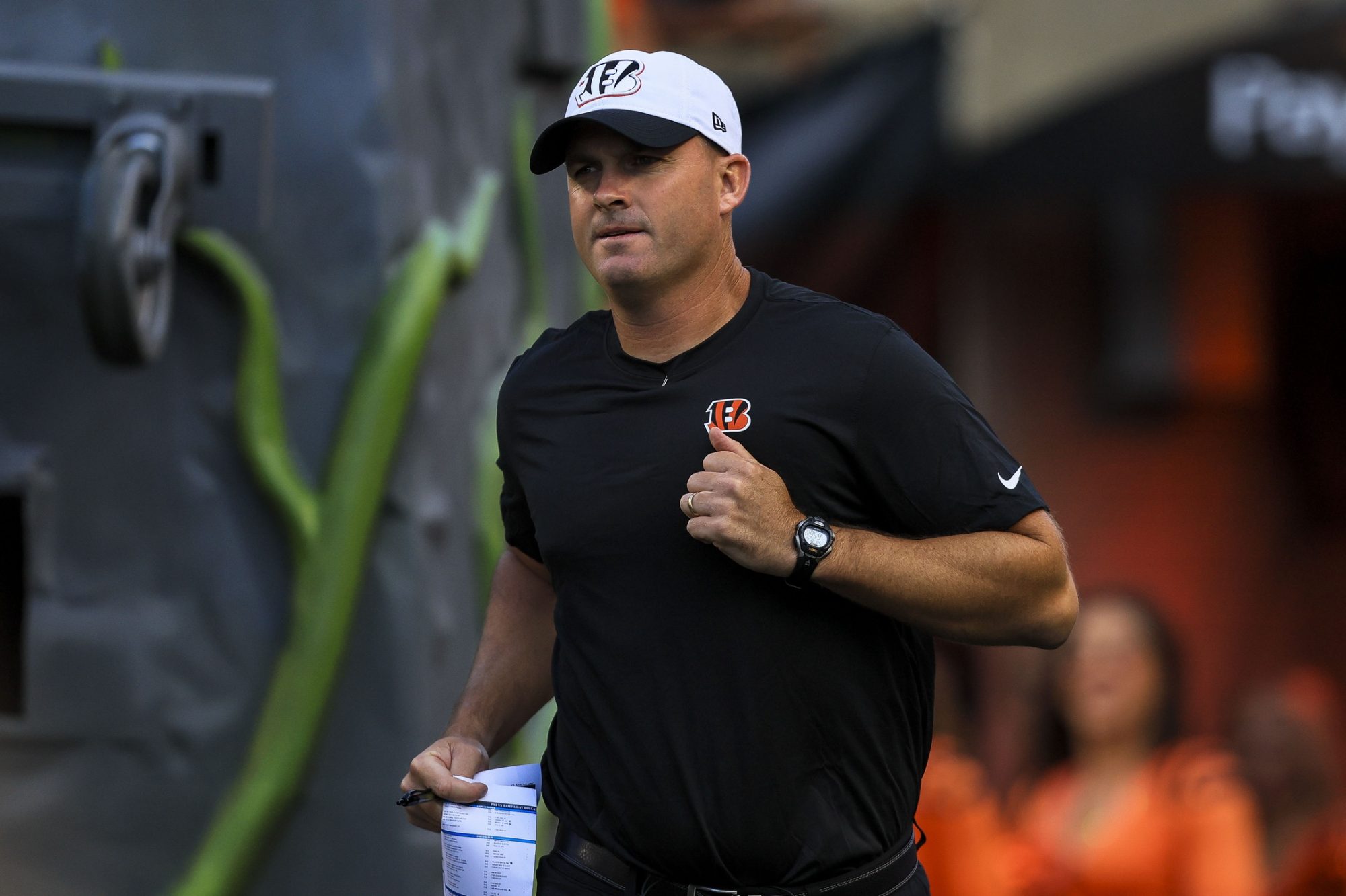 Aug 10, 2024; Cincinnati, Ohio, USA; Cincinnati Bengals head coach Zac Taylor runs onto the field before the game against the Tampa Bay Buccaneers at Paycor Stadium.