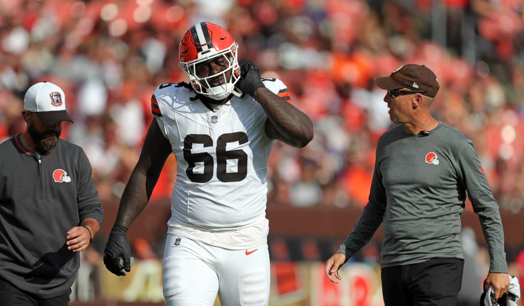 Cleveland Browns offensive tackle James Hudson III (66) walks off the field after getting banged up on a play during the first half of an NFL preseason football game at Cleveland Browns Stadium, Saturday, Aug. 17, 2024, in Cleveland, Ohio.