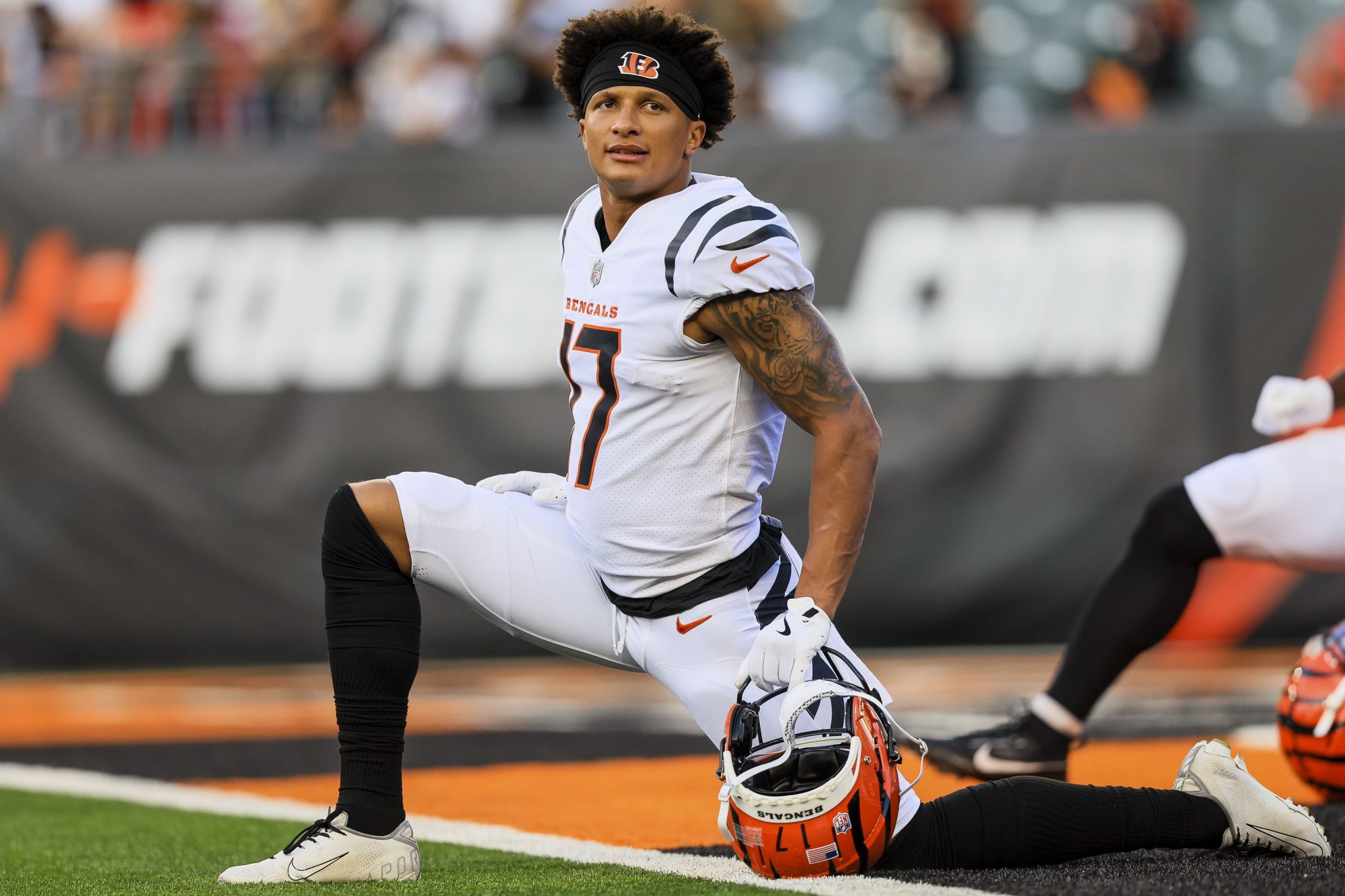 Aug 22, 2024; Cincinnati, Ohio, USA; Cincinnati Bengals wide receiver Cole Burgess (17) stretches during warmups before the game against the Indianapolis Colts at Paycor Stadium.