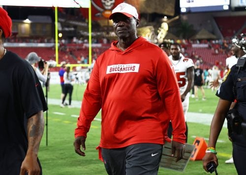 Aug 23, 2024; Tampa, Florida, USA; Tampa Bay Buccaneers head coach Todd Bowles walks off the field after they beat the Miami Dolphins during the second half at Raymond James Stadium.