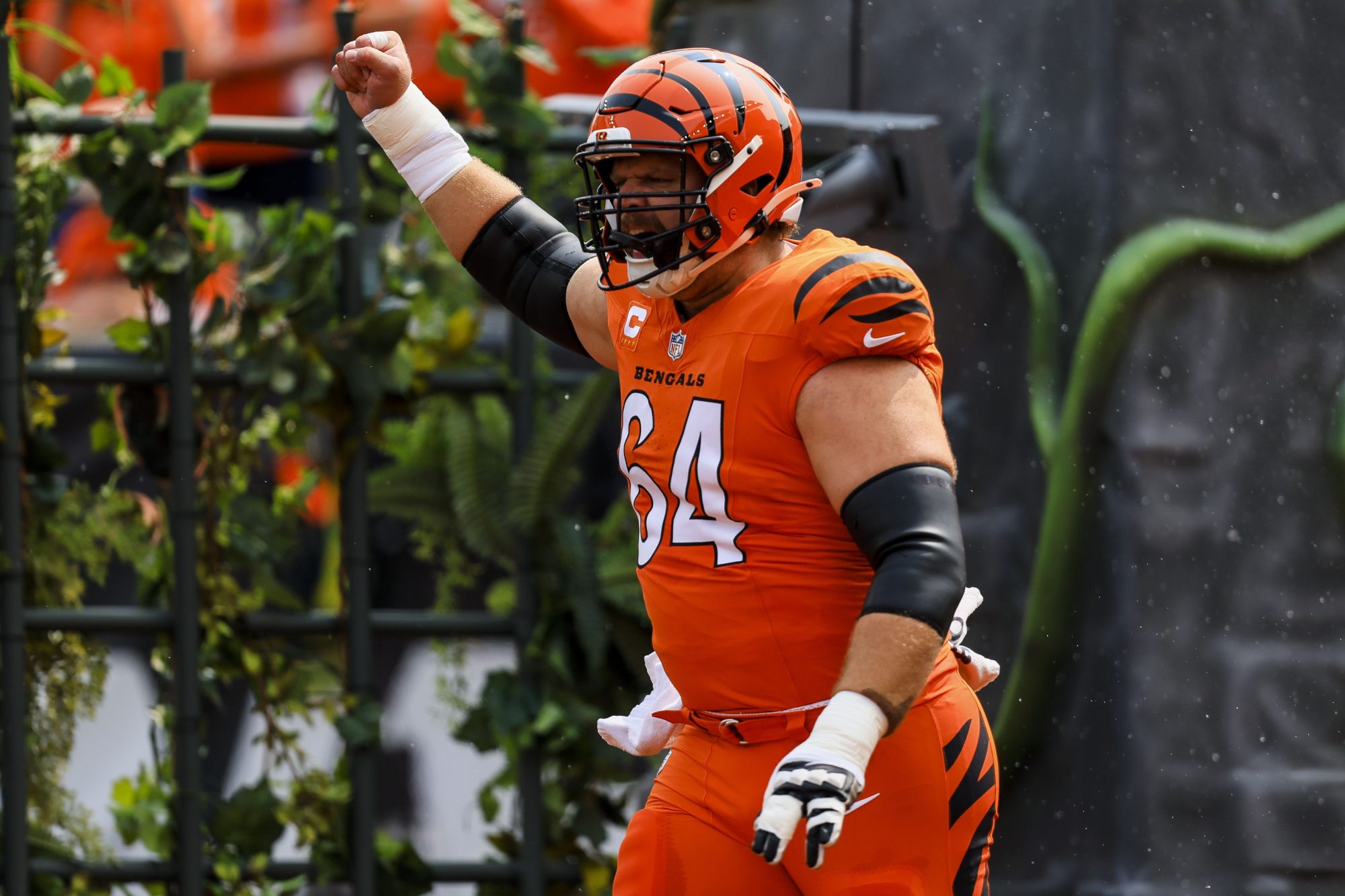 Sep 8, 2024; Cincinnati, Ohio, USA; Cincinnati Bengals center Ted Karras (64) runs onto the field before the game against the New England Patriots at Paycor Stadium.