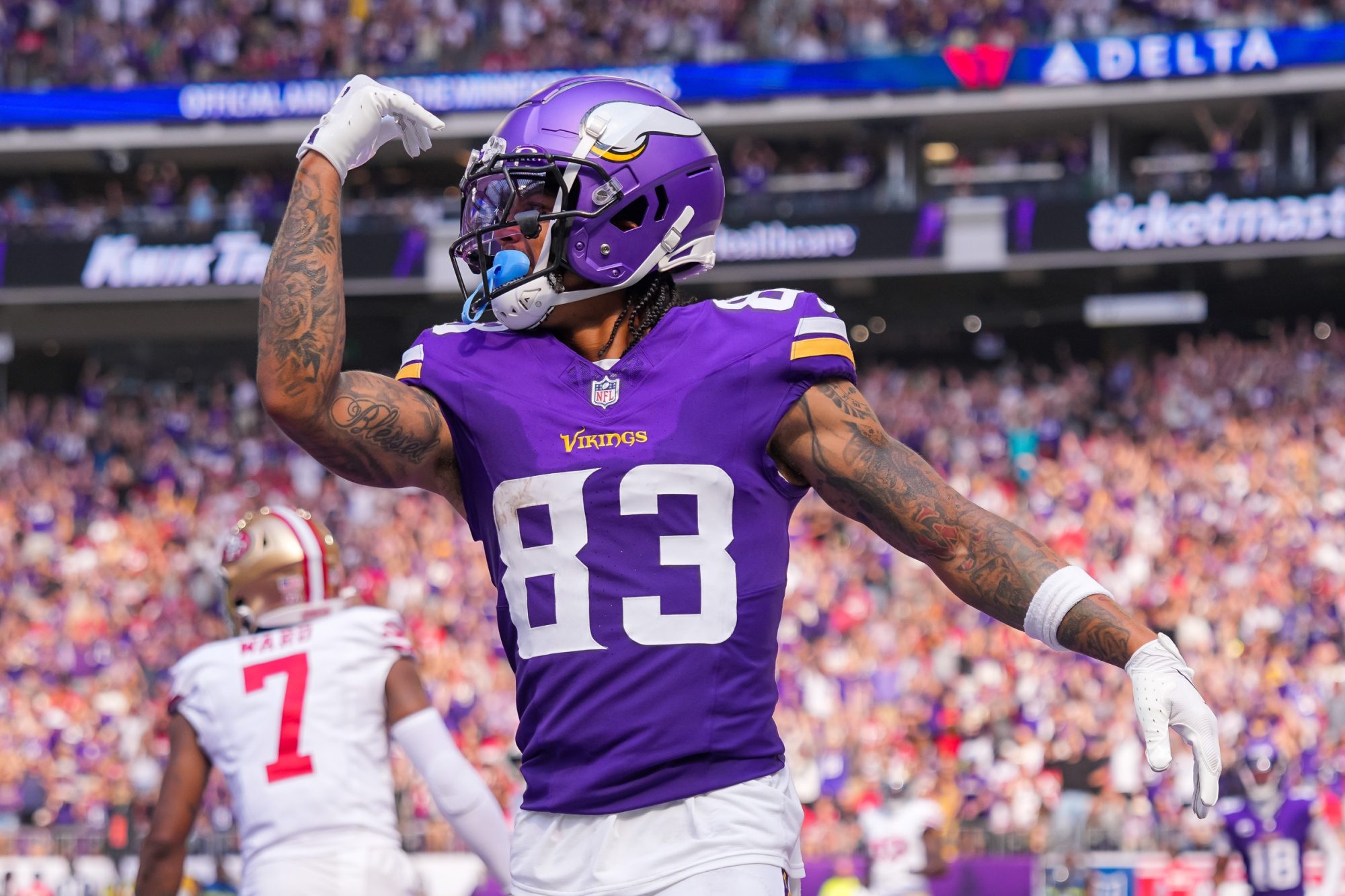 Sep 15, 2024; Minneapolis, Minnesota, USA; Minnesota Vikings wide receiver Jalen Nailor (83) celebrates his touchdown against the San Francisco 49ers in the third quarter at U.S. Bank Stadium.